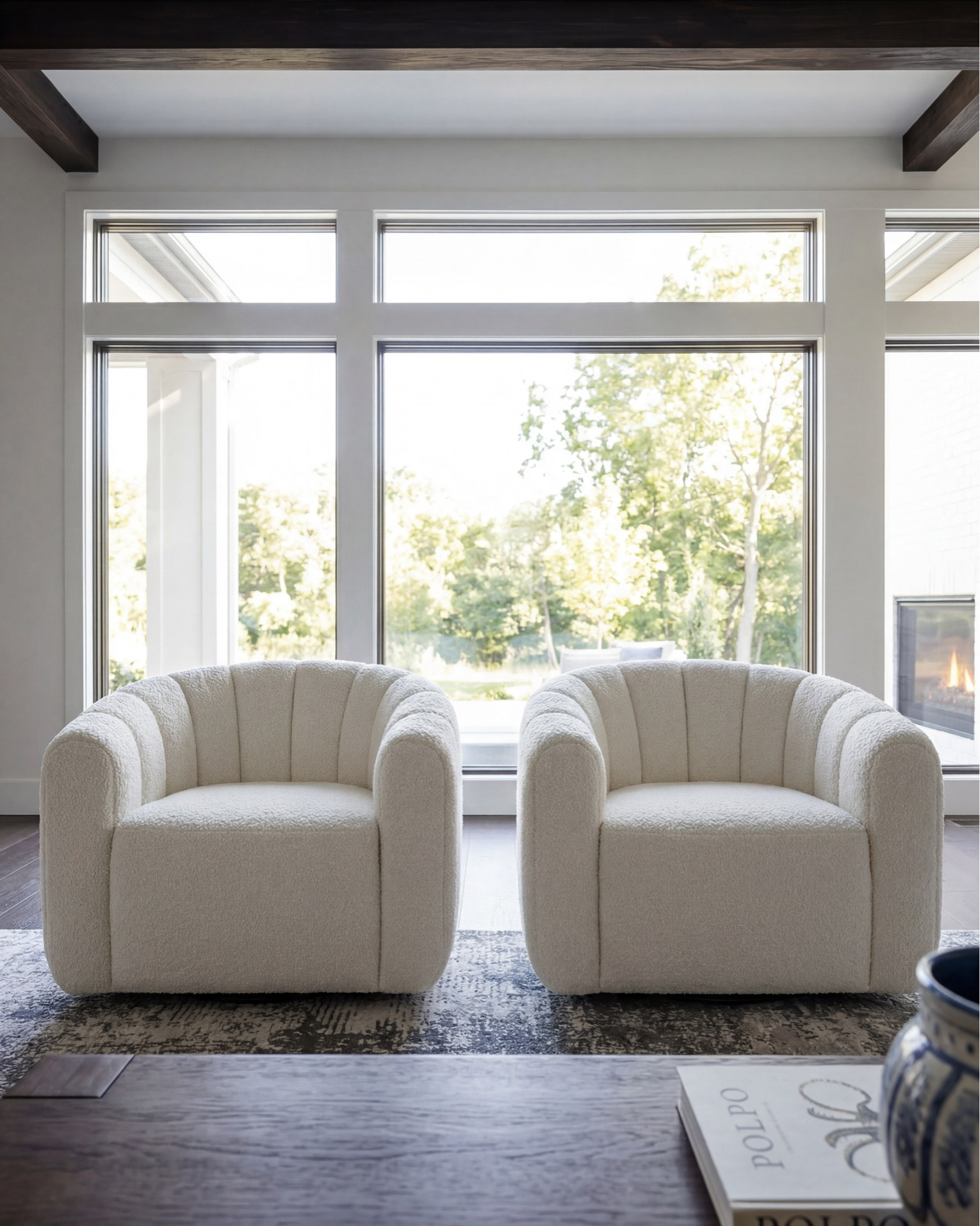 Layered transitional living room inspiration with luxe marble fireplaces, moody floral wallpaper, dark wood beams, boucle accent chairs, and designer lighting details. Shop the look for a cozy modern organic home with high-end furniture, neutral decor, blue accents, brass lighting, textured rugs, and timeless statement pieces. Perfect inspiration for anyone searching for transitional style living rooms, modern farmhouse decor, marble fireplace ideas, designer coffee tables, and curated home accessories. 

Shop this space: • Marble fireplace surround • Dark wood ceiling beams • Brass chandelier lighting • Boucle accent chairs • White slipcovered sofa • Blue patterned throw pillows • Dark wood coffee table • Abstract framed artwork • Textured neutral area rug • Ceramic table lamps • Built-in shelving decor • Decorative woven baskets • Floral wallpaper mural • Fringe ottomans • Fluted console table • Brass wall sconces • Ribbed cabinetry details • Marble slab backsplash • Glass cabinet fronts • Wine fridge built-in • Blue and cream vintage style rug • Modern ceramic vases • Coffee table styling books • Neutral cozy throw blankets

#LTKsale #LTKhome #LTKstyletip