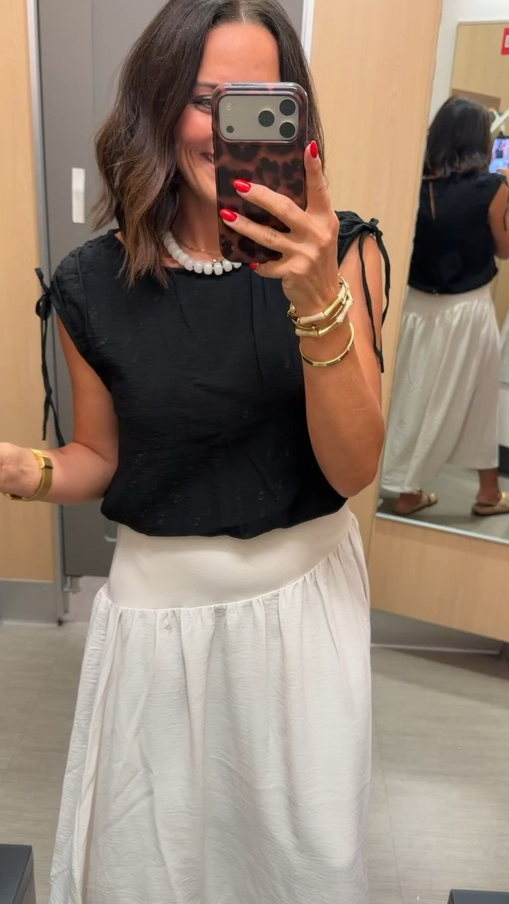 Found the prettiest Target outfit 🤍

This black and white combo looks so chic and classic, but it's still comfortable enough for everyday wear. Perfect for church, work, dinner, or whenever you want to look a little more put together without trying too hard.

Size XS
5'3 for reference

#targetstyle #targetfinds #targetfashion #classicstyle #summeroutfit #affordablefashion #lookforless #midskirt #everydaystyle #casualchic #targethaul #fashionfinds #ltkstyle #ltkfashion #summerstyle