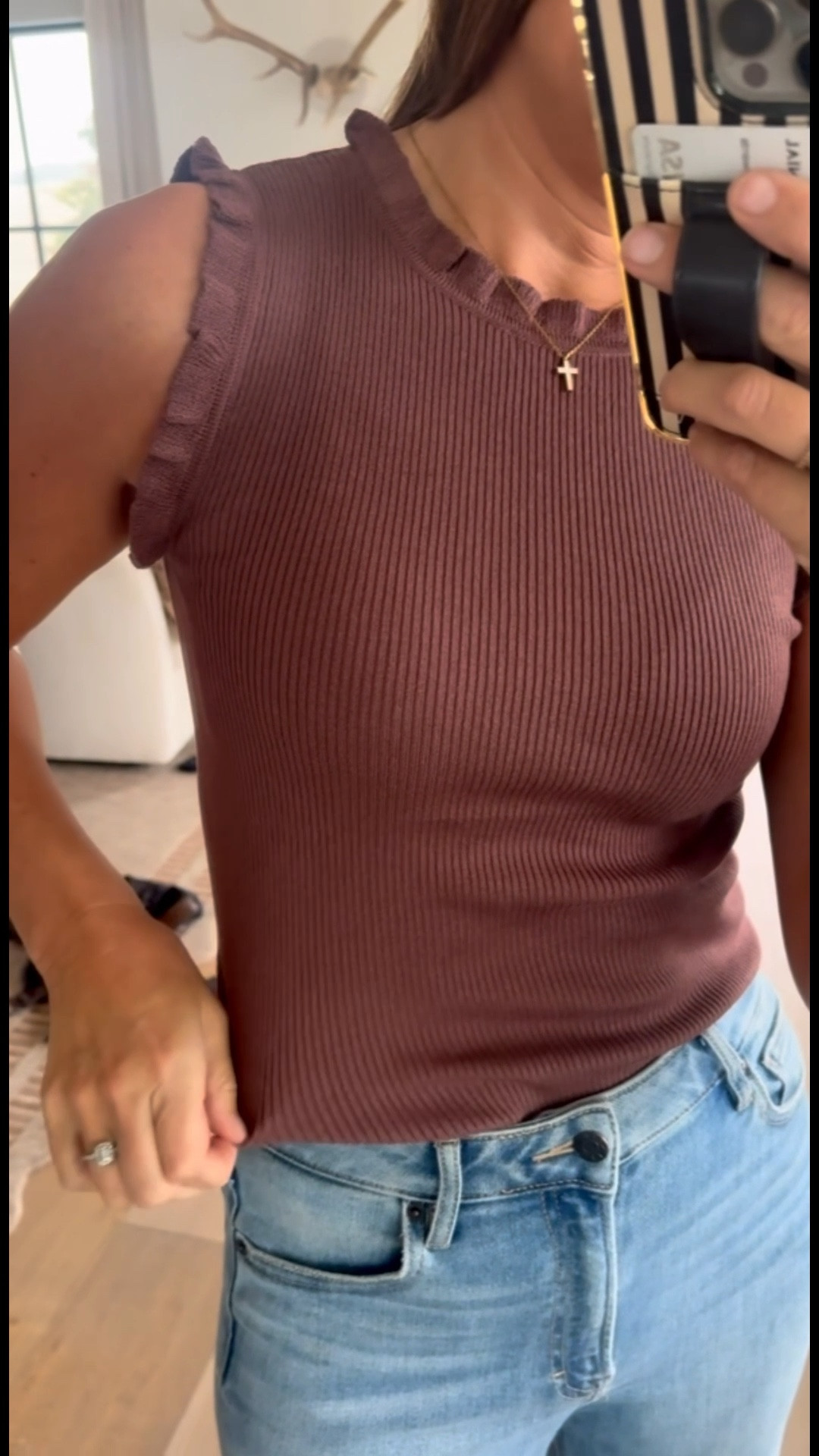 2 sweater tanks under $15 each! Super cute design and cut. I’m wearing a size small in both. 