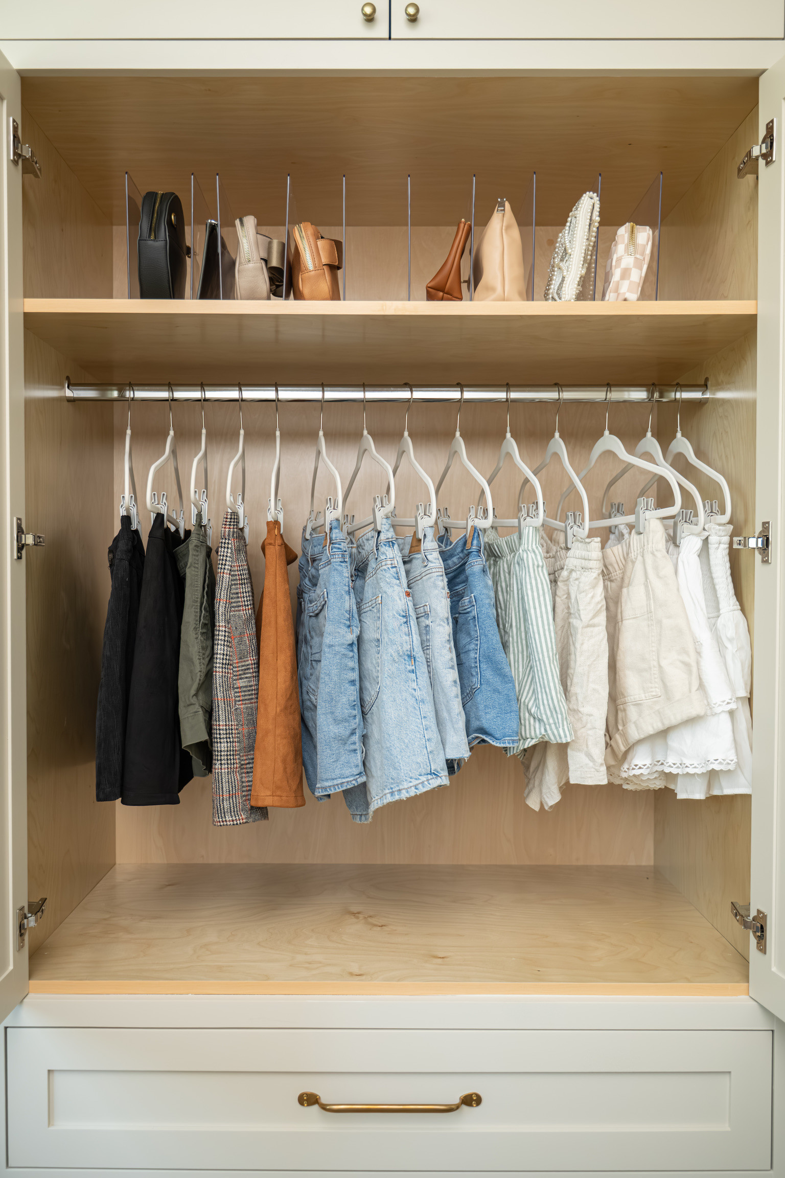 Simple products such as an acrylic purse organizer or flocked, velvet hangers elevate this primary closet from our Cedar & Oak home tour  #LTKFindsUnder50 #LTKFindsUnder100

#LTKHome