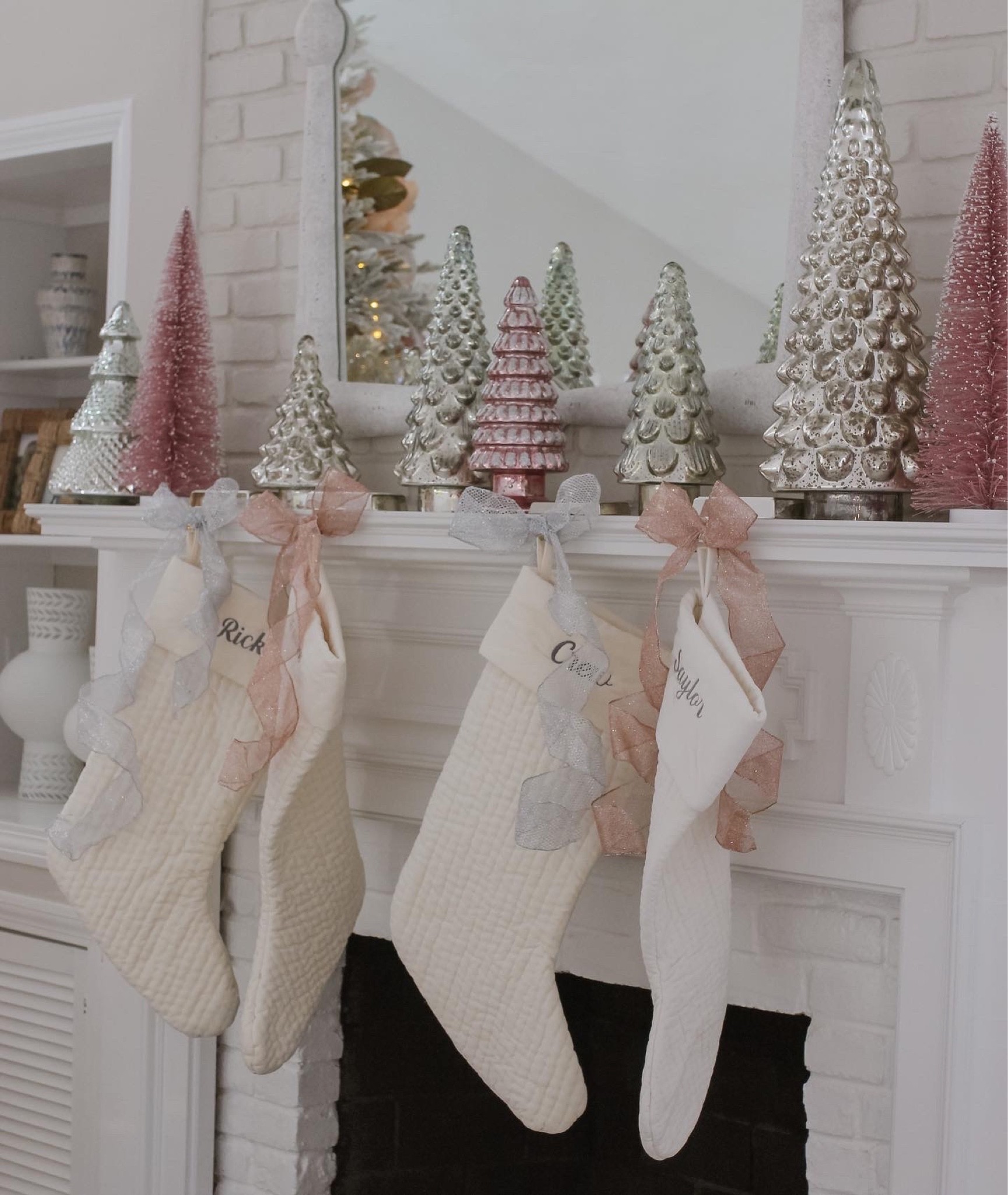Holiday Mantel Decor

My quilted monogrammed stockings are the large size.

#fauxtree #christmastree #flockedtree #flocked #christmas #christmasdecor

Flocked tree, artificial Christmas tree, Christmas decorations, king of christmas, snowy tree, green Christmas tree, white Christmas tree, bedroom, home, decor, holiday decor, ornaments, stockings, pastel holiday, white holiday decor, bottle brush trees, pink decor, white Christmas 

#LTKhome #LTKHoliday #LTKSeasonal