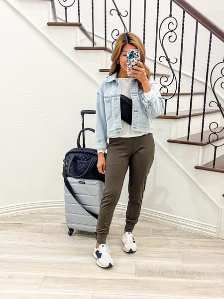 Travel outfit, airport outfit
Joggers in XS,tts,color is Olive Green.
White top in small, tts.
Denim jacket in small tts.
New Balance 327 shoes tts.
Belt bag, carry-on luggage, black personal carry-on bag all linked.
Amazon finds, road trip, causal outfit, comfy outfit, white sneakers.

#LTKtravel #LTKFind #LTKunder50