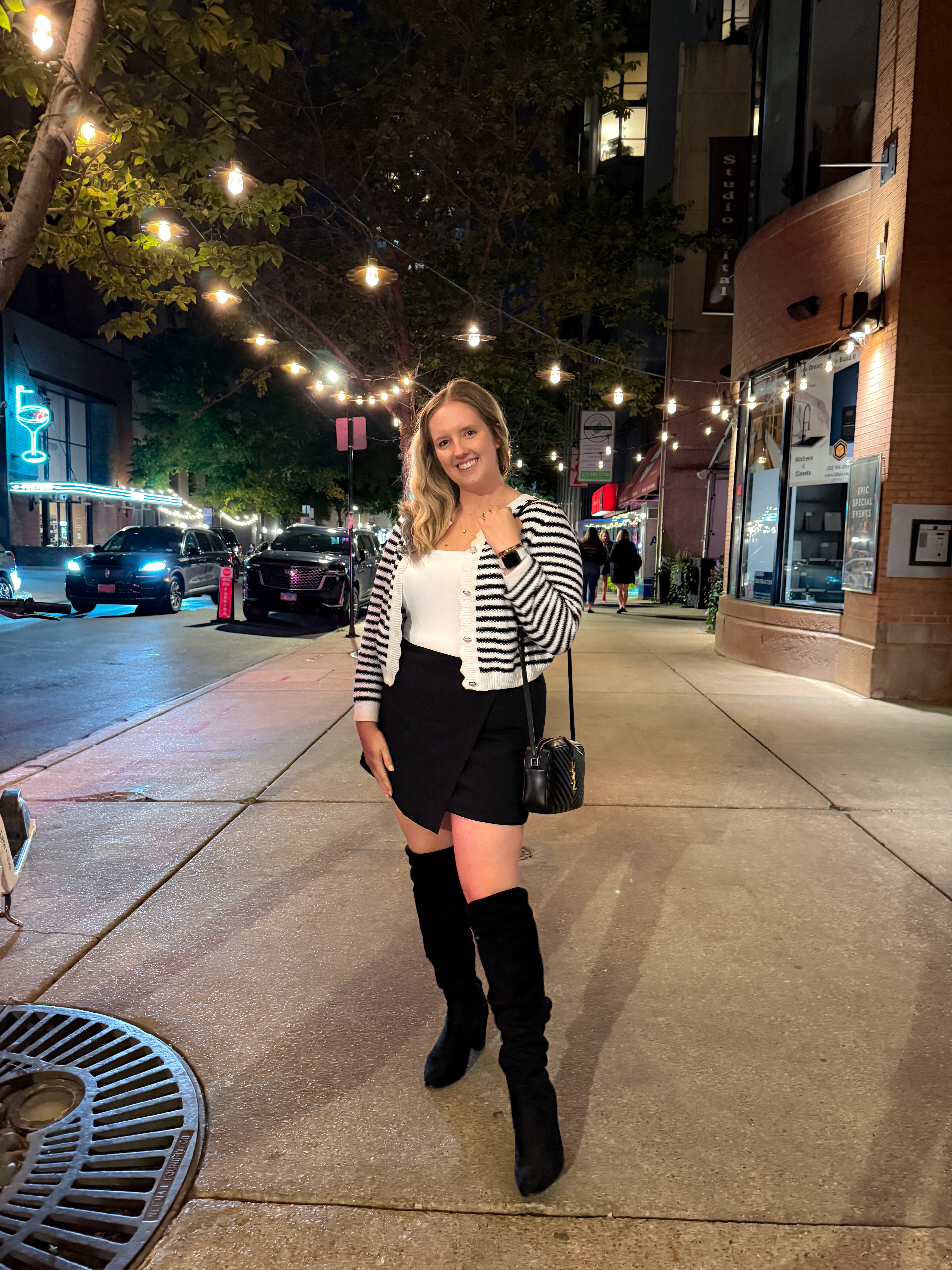 Love this skort with the preppy striped cardigan for such a classy timeless look. Was one of my favorite recent date night outfits as of late. The over the knee black boots and black YSL camera bag make the perfect accessories. Boots are incredible but they do run small FYI!

#LTKFindsUnder100 #LTKMidsize #LTKSeasonal