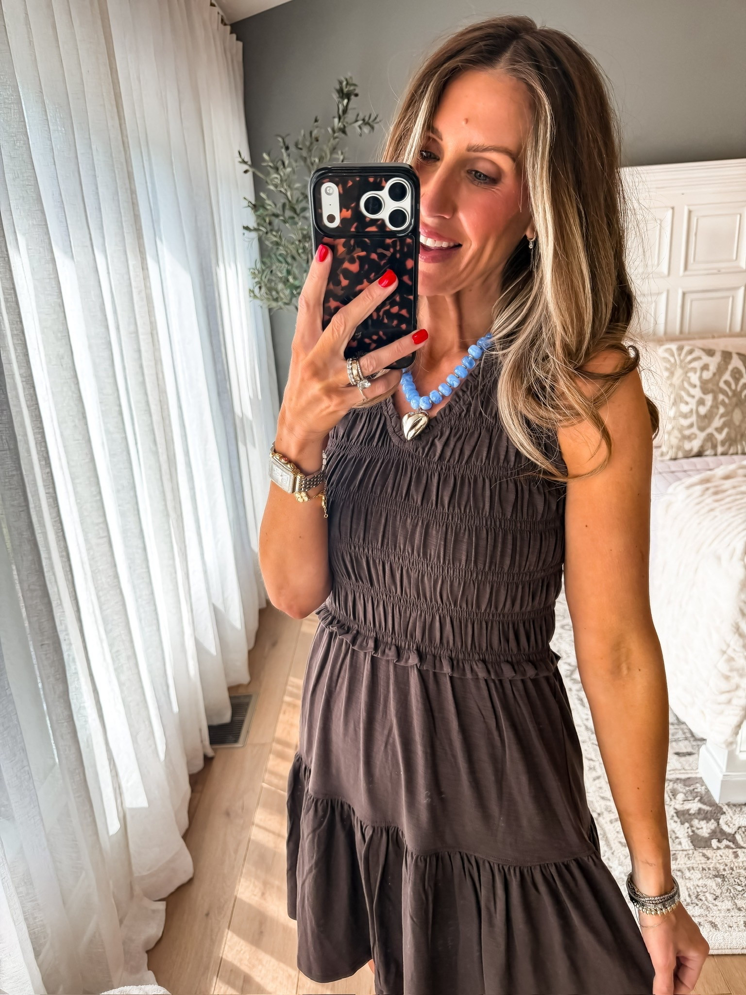 This dress is one of those easy throw on pieces that still looks so put together. I love the smocked detail and flowy fit, and paired with the blue statement necklace it gives the prettiest contrast for summer.

smocked dress, brown dress outfit, summer dress style, casual chic outfit, easy everyday dress, vacation outfit inspo, neutral fashion, feminine style, affordable fashion finds, summer outfit ideas, statement necklace outfit, themominstyle

#LTKootd #LTKSeasonal #LTKTravel