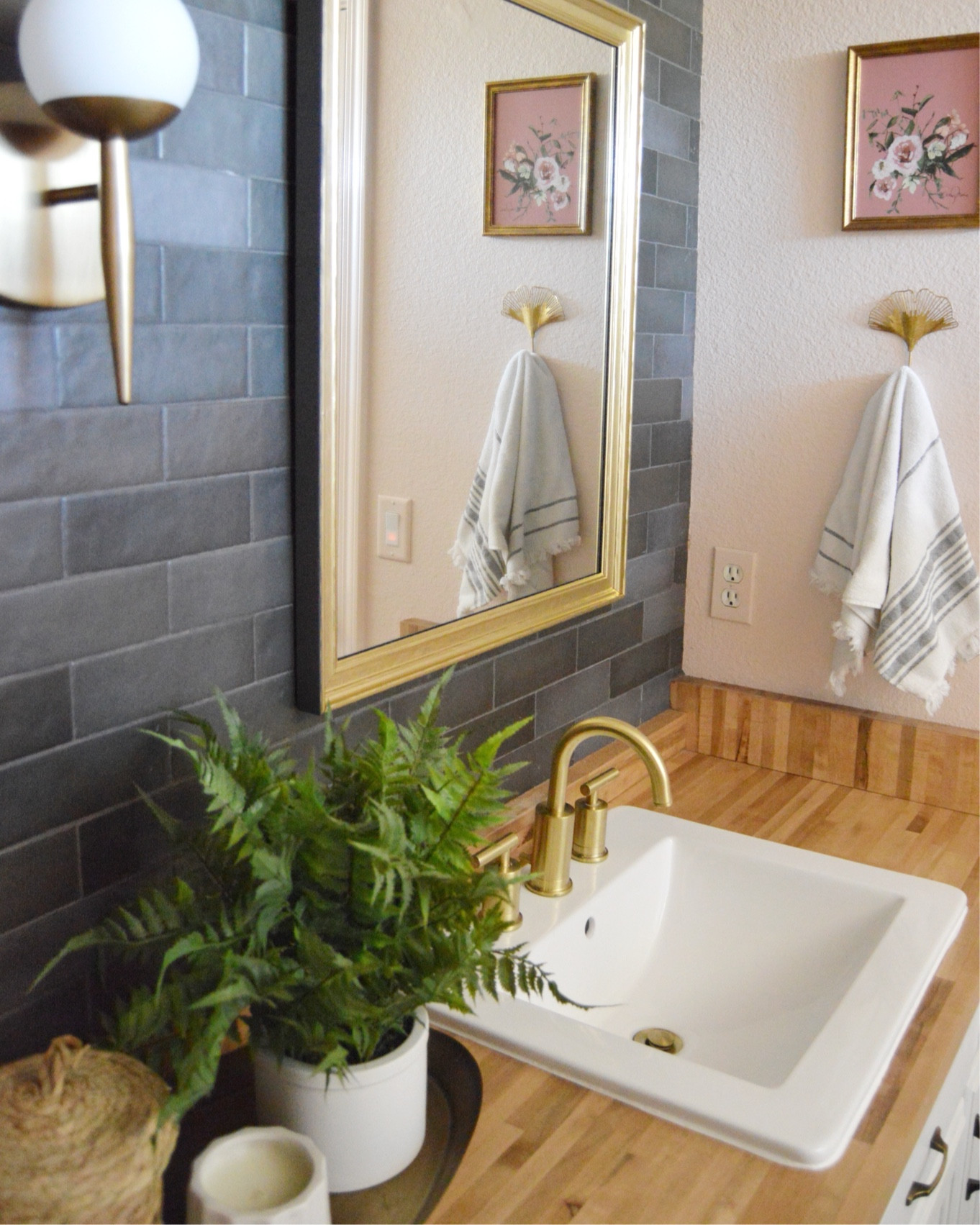 Bathroom remodel featuring a new wall mirror, faucets, faux plant, wall art, towels, light fixture, sink, and more! #bathroomdecor #homedecor #homefinds

#LTKHome #LTKFindsUnder50 #LTKFindsUnder100