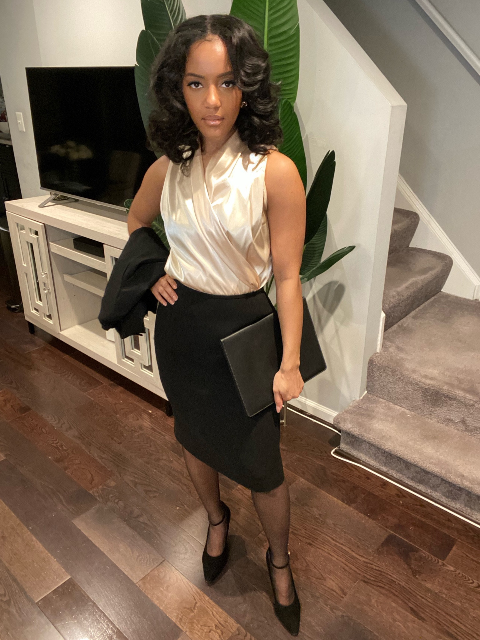 Never underestimate the power of a wrap blouse to complement a traditional black suit. Sharing my favorite Amazon find below. #workwearstyle #amazonfind 

#LTKstyletip #LTKworkwear