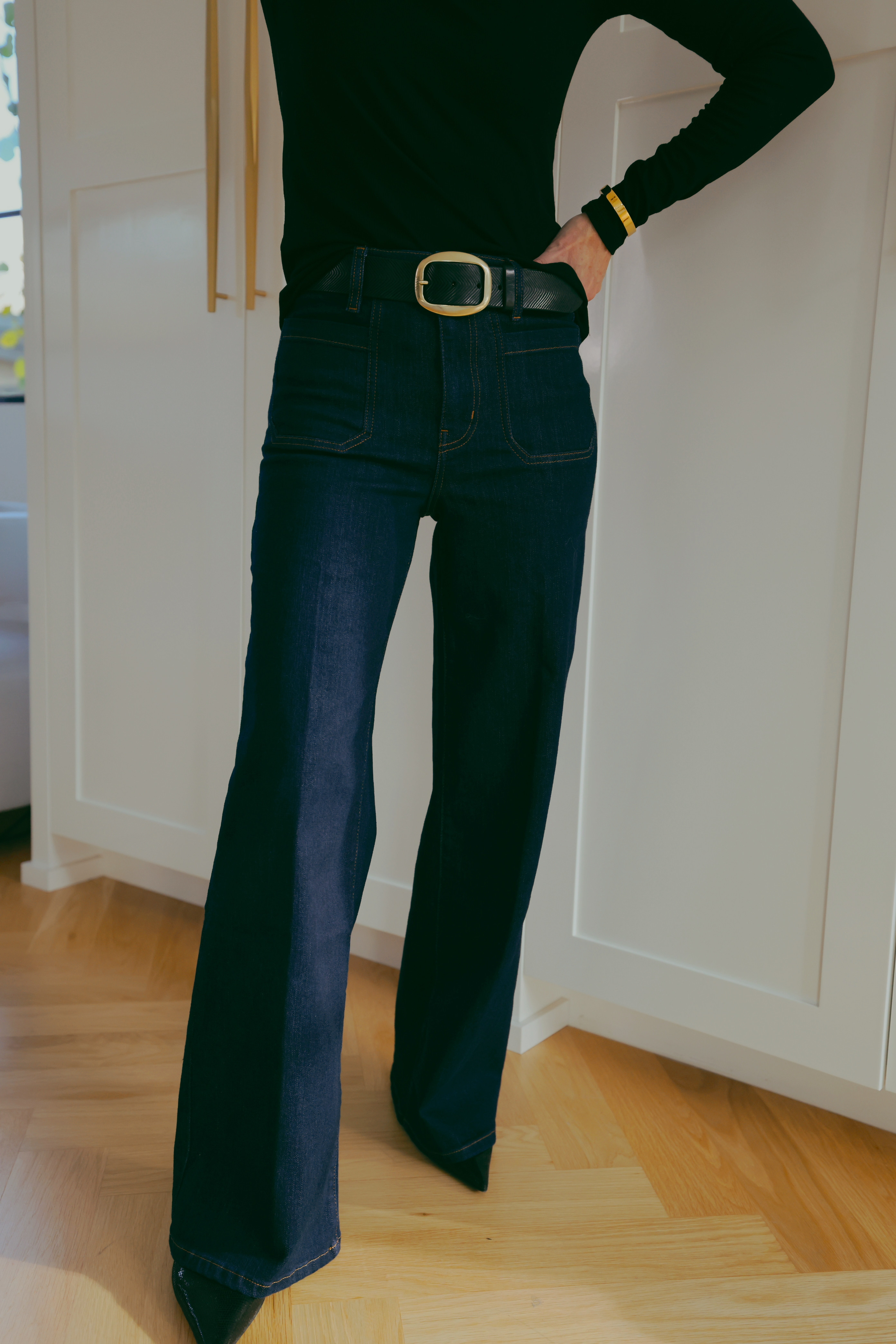 The patch pocket on the FRAME dark wash wide leg jean is the detail that makes all the difference!

It sits right at the high waist and draws the eye upward; which visually lengthens the leg and creates the appearance of a longer torso. Paired with a wide leather belt and gold buckle, the waist definition is everything.

#LTKgrwm #LTKOver40 #LTKSaleAlert