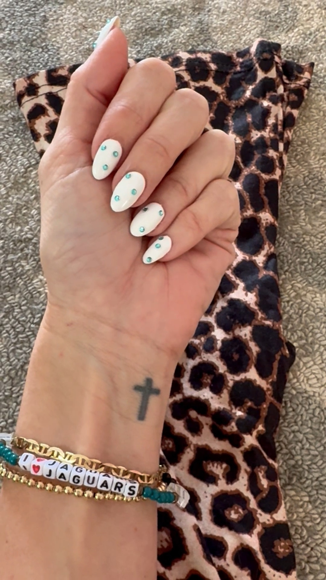 Dressed up my nails for game day 😍
I can’t be trusted around rhinestones… I’ll be bedazzling everything lol. 🤷🏼‍♀️💁🏼‍♀️
NFL. Jacksonville Jaguars. Jax Jags. OOTD. FOOTBALL GAME. Nail art  

#LTKBeauty #LTKselfcare #LTKootd