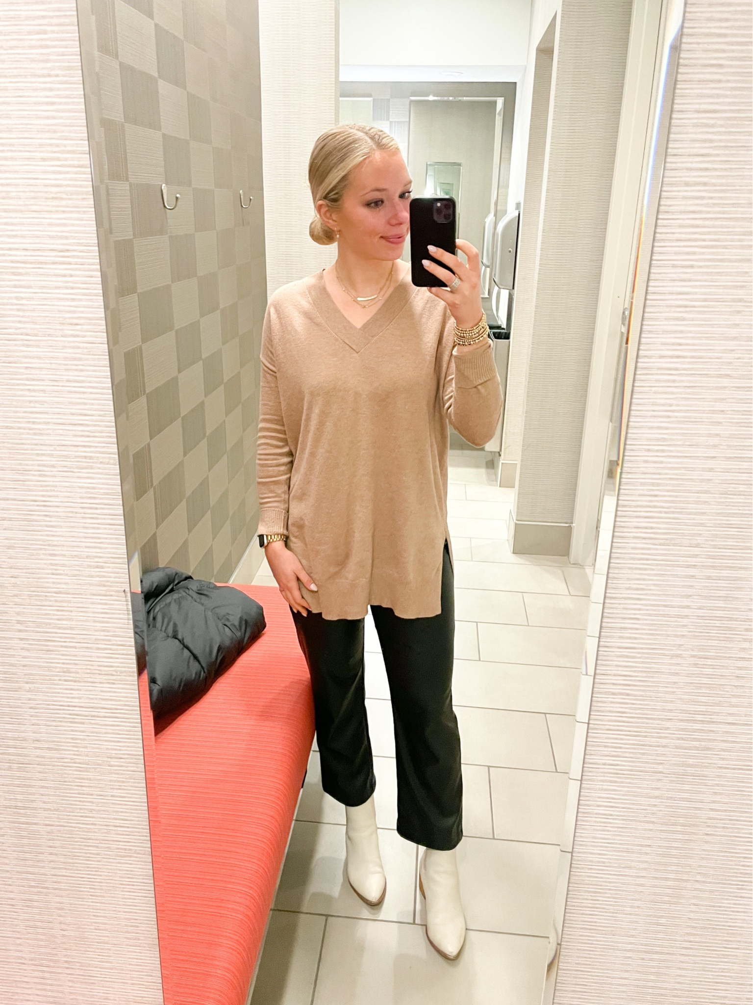 Closet staples: camel sweater, black leather pants, white booties 
