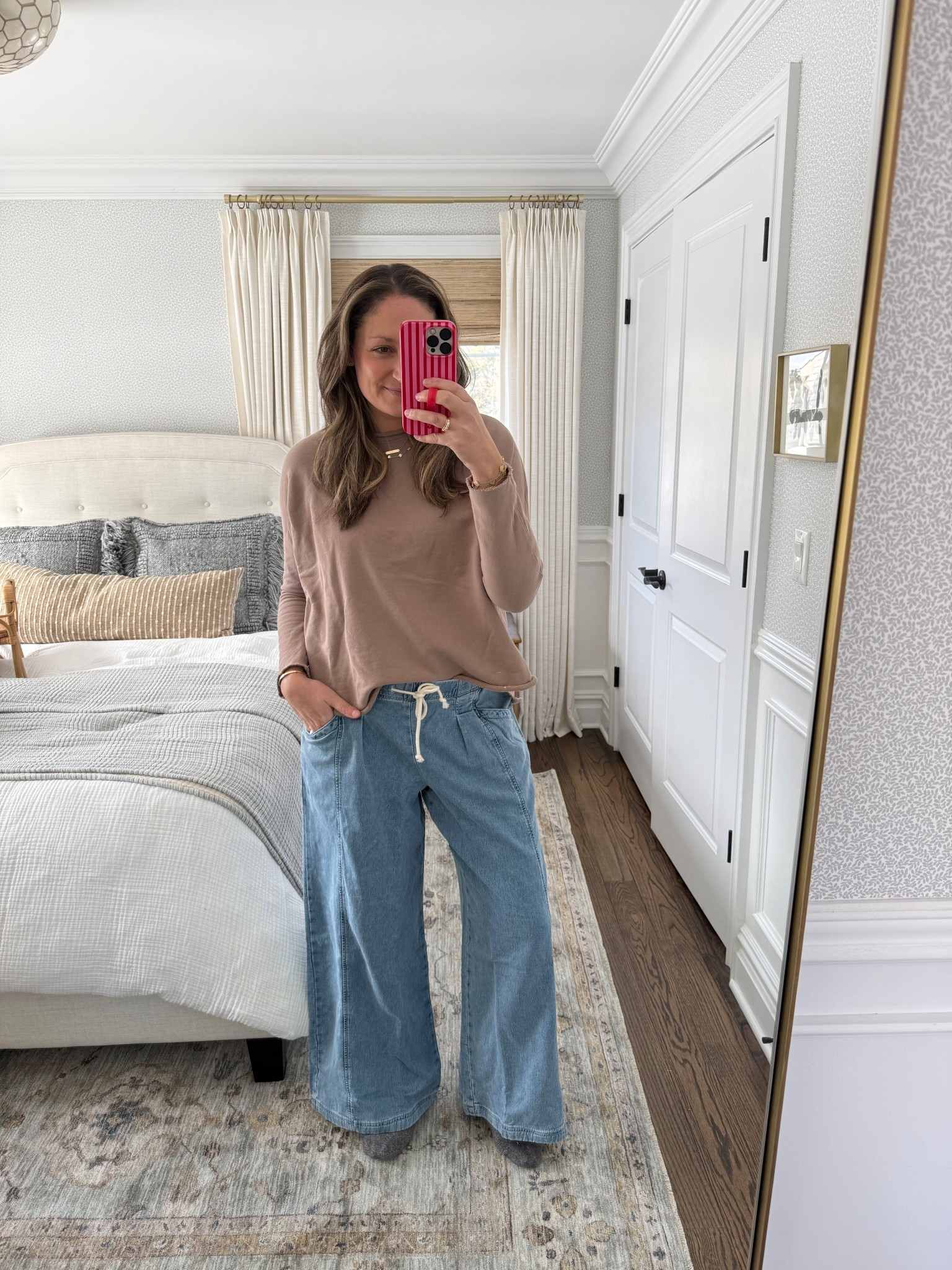 The cutest wide leg pull-on jeans from @Aerie!! Still on sale and the come in all sizes and lengths. Paired with an easy top, cozy earth socks and my everyday jewelry stack! 

#LTKSaleAlert #LTKSeasonal #LTKootd