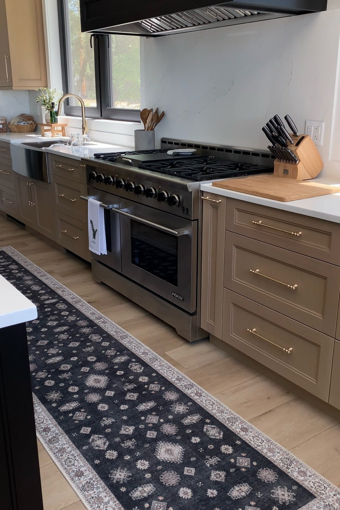 Lake house kitchen finds 🫶🏼

Kitchen runner rug lake house kitchen wooden cabinet Amazon cabinet pulls 

#LTKHome