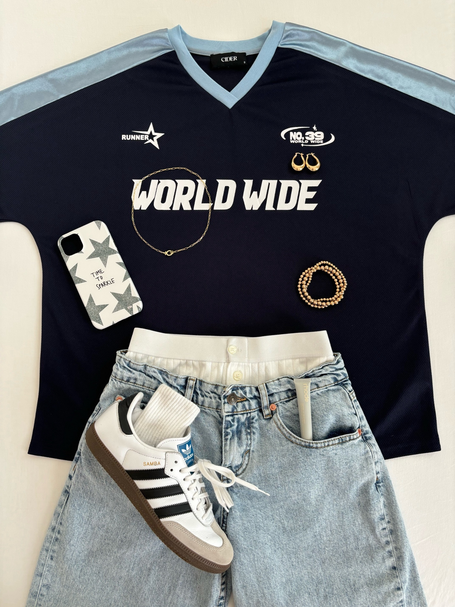 Jeans are from Motel Rocks and the phone case is from Snowy Waves