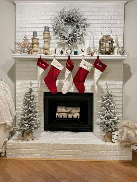 Christmas mantle 
Christmas fireplace 
Small flocked trees
Flocked wreath 
Flocked garland set
Pottery barn red and white stockings
King of Christmas
Stocking holder 

#LTKhome #LTKstyletip #LTKHoliday