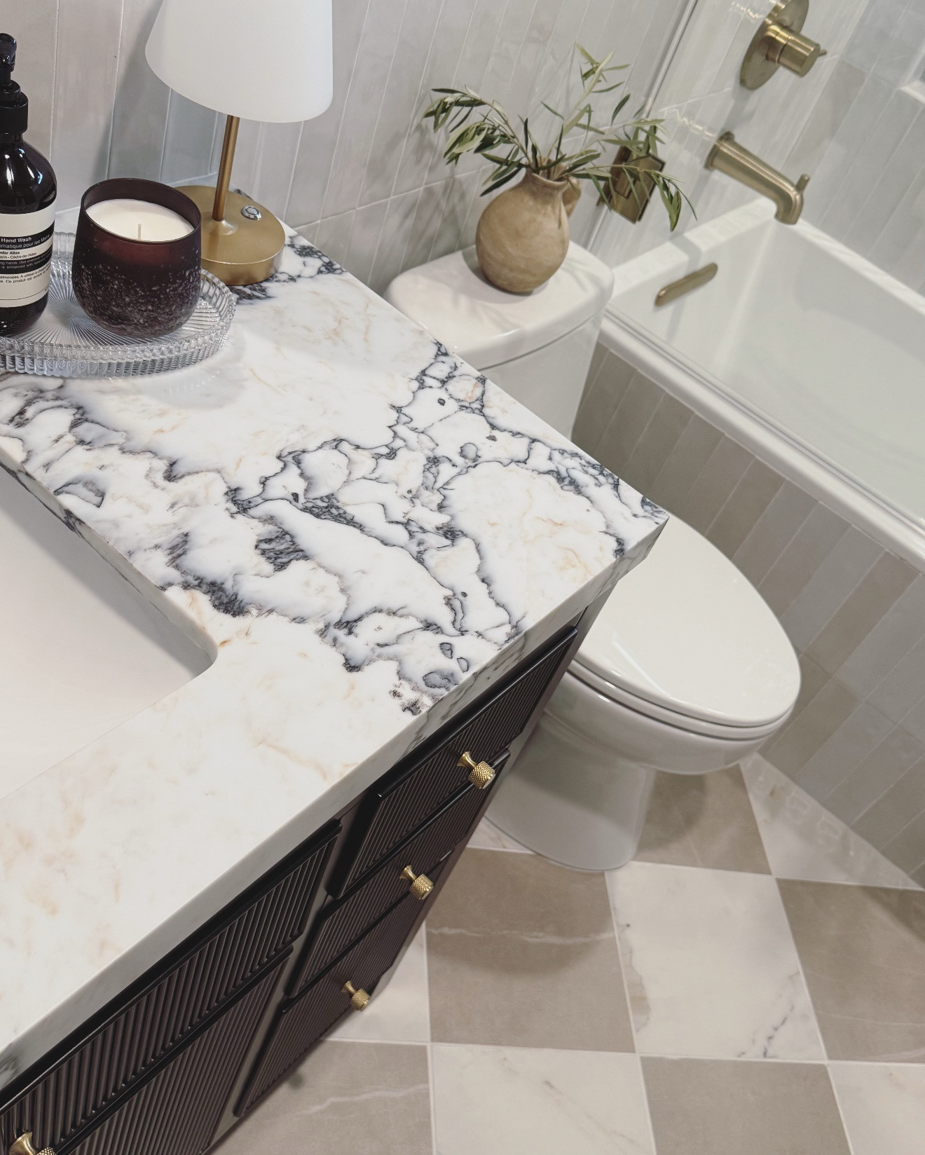 Guest Bathroom remodel with Viola countertops, tiled checkerboard flooring and a black fluted vanity.
~ Everything linked

#bathroomremodel
#guestroom


#LTKOver40 #LTKHome