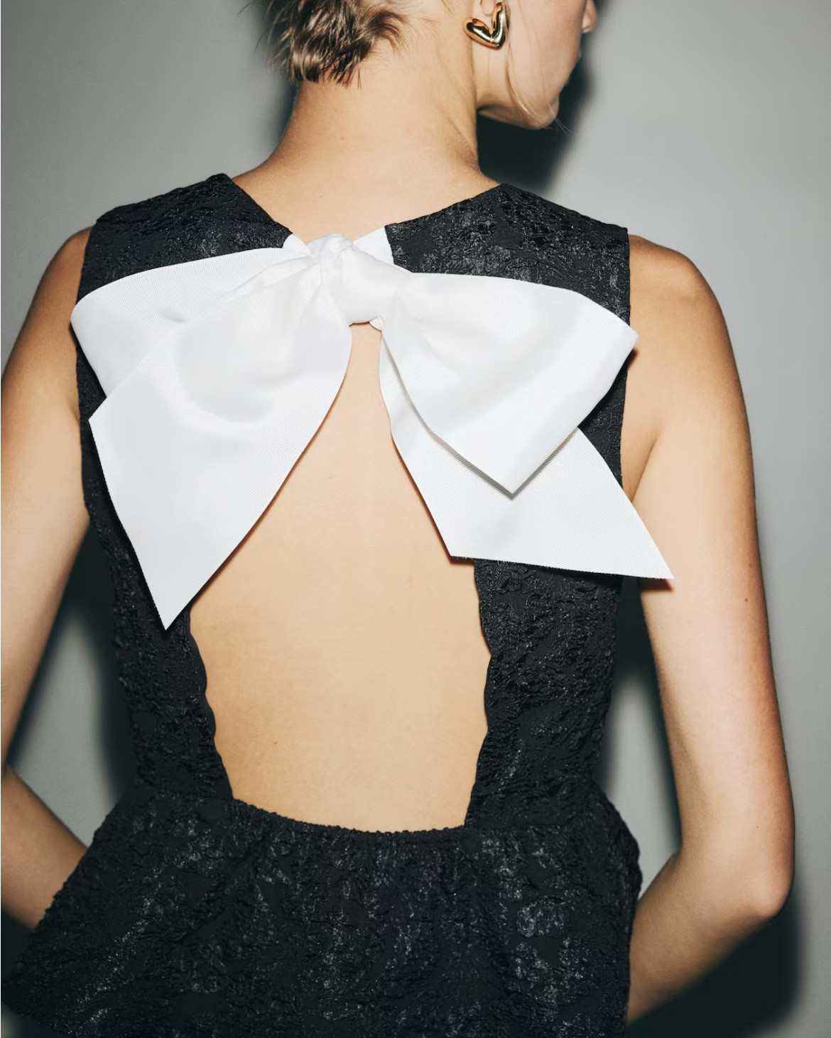 Black bow back jacquard peplum tank top

#LTKFindsUnder50 #LTKSeasonal