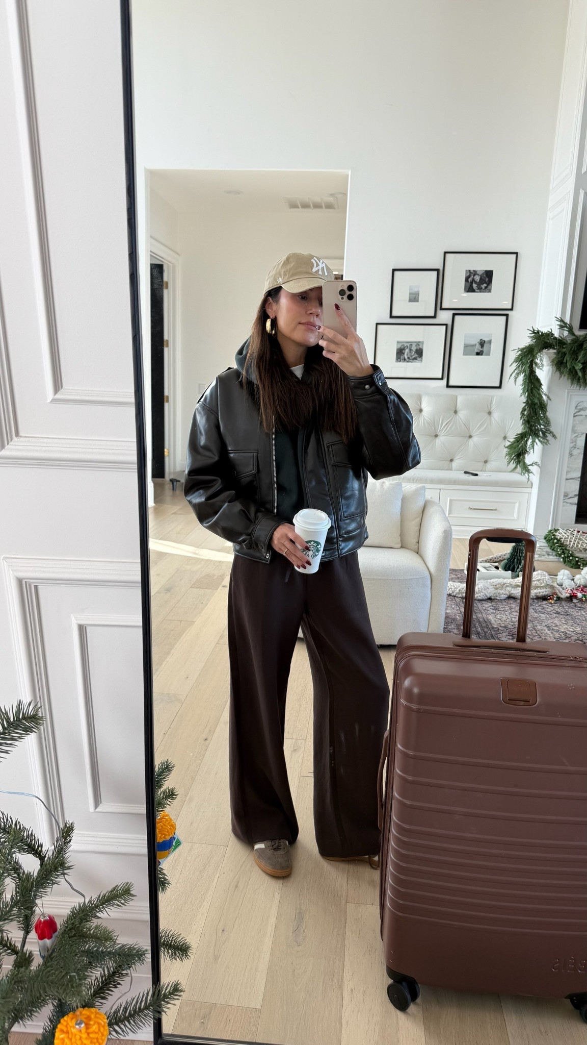 Travel outfit ✈️ loving this new leather bomber jacket! And these wide legs pants are my must have travel pants! So comfy and wrinkle free 🤍

Sizing:
Pants- small
Hoodie- medium
Jacket- small

Travel outfit, airport outfit, airplane outfit, aritzia, Beis suitcase, brown suitcase, brown pants, travel pants, aritzia coat
@aritzia @adidas @beis @amazonfashion

#LTKootd #LTKTravel #LTKHoliday