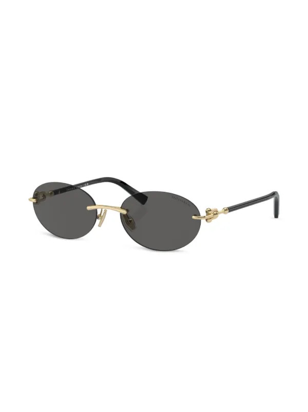 Tiffany & Co Eyewear Oval Frame Tinted Sunglasses | Black | FARFETCH UK | Farfetch Global