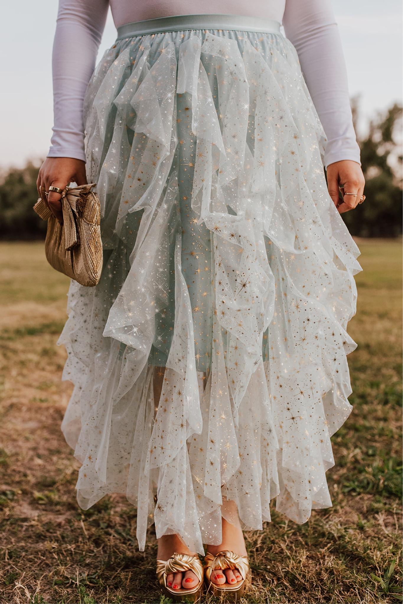my Pink Desert twinkle fairy mint tulle midi skirt for the Holidays! wearing size xl. is lined and has an elastic waist + gold star print. goes to size xxxl! wearing xl in bodysuit 

#LTKcurves #LTKunder100 #LTKHoliday