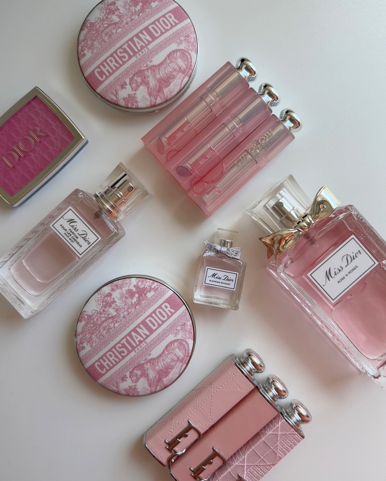 Blushing over this pink Dior moment — elegance, romance, and just a touch of Parisian magic in every detail. From the glow to the gloss, this flatlay is all things soft, feminine, and so très chic.💖✨ 

#DiorBeauty #PinkFlatlay #DiorLover