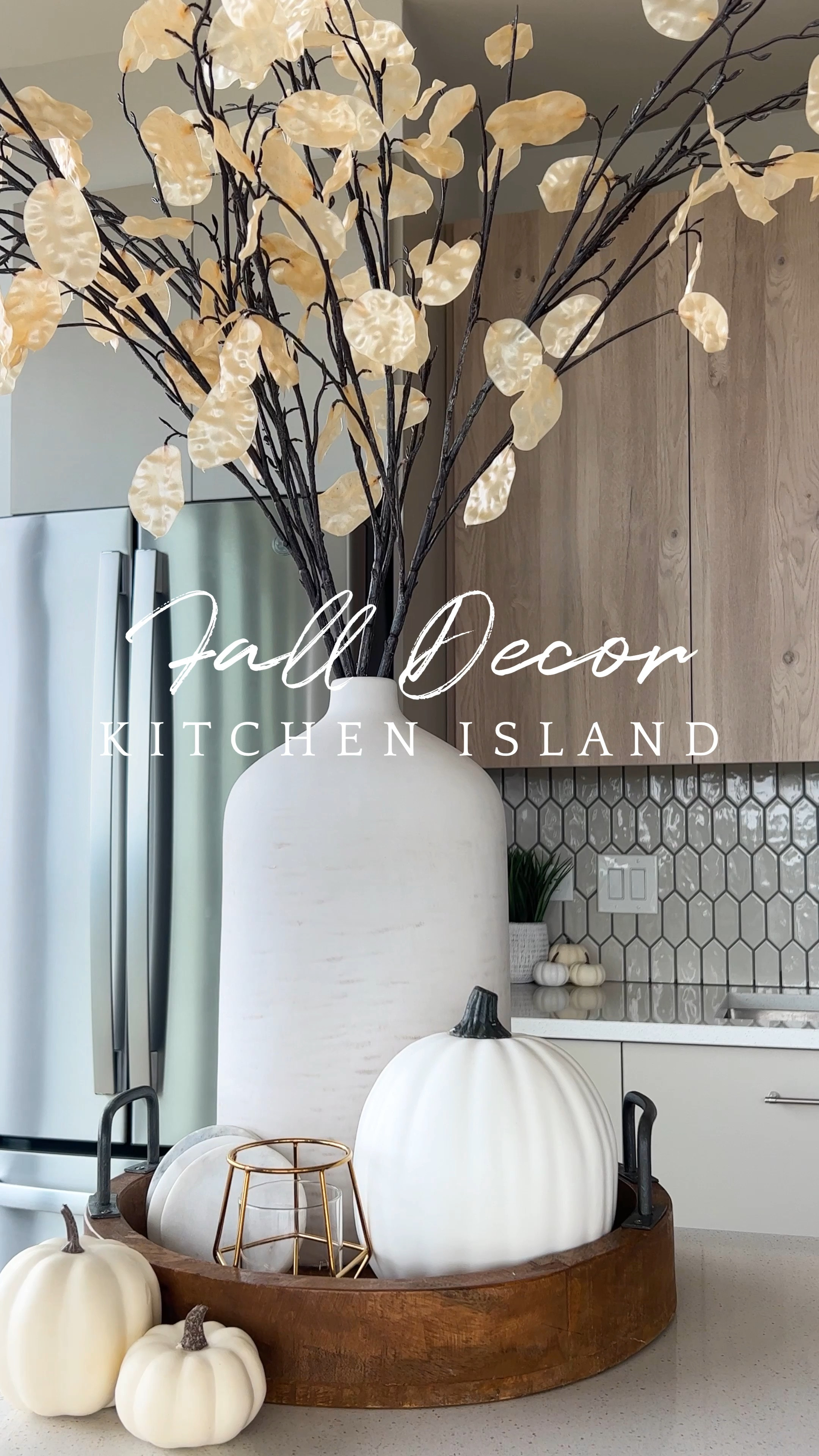 Fall Decor for my Kitchen Island. I used items that I’ve owned for years like the round wood tray from Home Goods and the faux pumpkins/tea candle holder. I added two new items like the vase from Target & the steams that I found for 50% off at Hobby Lobby. 

#LTKSeasonal #LTKhome #LTKfindsunder50