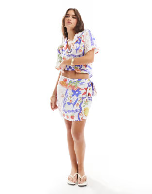 ASOS DESIGN wrap detail co-ord skort in mosaic fruit print | ASOS (Global)