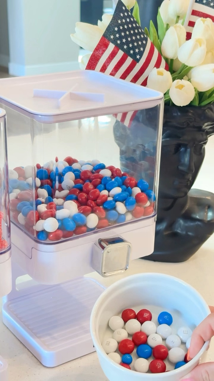 Turning up the fun this 4th of July with these red, white, and blue candy dispensers! They’re such a fun and festive way to serve treats at your 4th of July party, parade setup, or backyard BBQ—and the kids (and adults!) love them.
We filled ours with a mix of patriotic-colored sweets, and they’re perfect for grabbing a quick treat without the mess.
Here are some fun 4th of July candy ideas to use in your dispensers:
	•	Red, white & blue M&Ms
	•	Cherry and blue raspberry jelly beans
	•	Red licorice bites
	•	Star-shaped gummies
	•	Sour Patch Kids (red & blue)
	•	Mini gumballs
	•	Red, white & blue Sixlets or Skittles
	•	White chocolate pretzel bites with sprinkles
These 4th of July candy dispensers double as decor and snacks, making them perfect for a patriotic dessert table, candy bar, or even for gifting!

4th of July party ideas, patriotic candy bar, red white and blue treats, dessert table inspiration, candy dispensers, festive snacks, Independence Day fun, party decor ideas, backyard BBQ treats, summer celebration essentials

#LTKSummerEdit #LTKSeasonal #LTKFamily