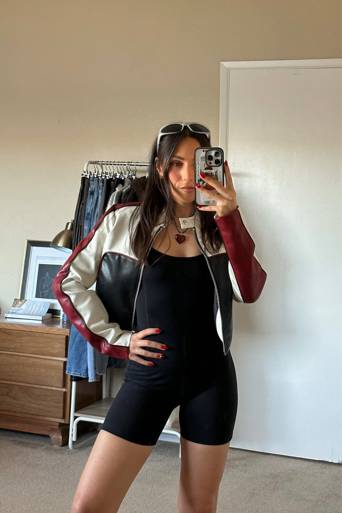 can’t get enough of moto jackets 🍒🖤 moto jacket | bodysuit | jumpsuit | athleisure | silver sunglasses | sporty style | edgy outfit | glass heart necklace | red outfits | black outfits | casual everyday outfit inspo

#LTKunder100 #LTKstyletip #LTKSeasonal