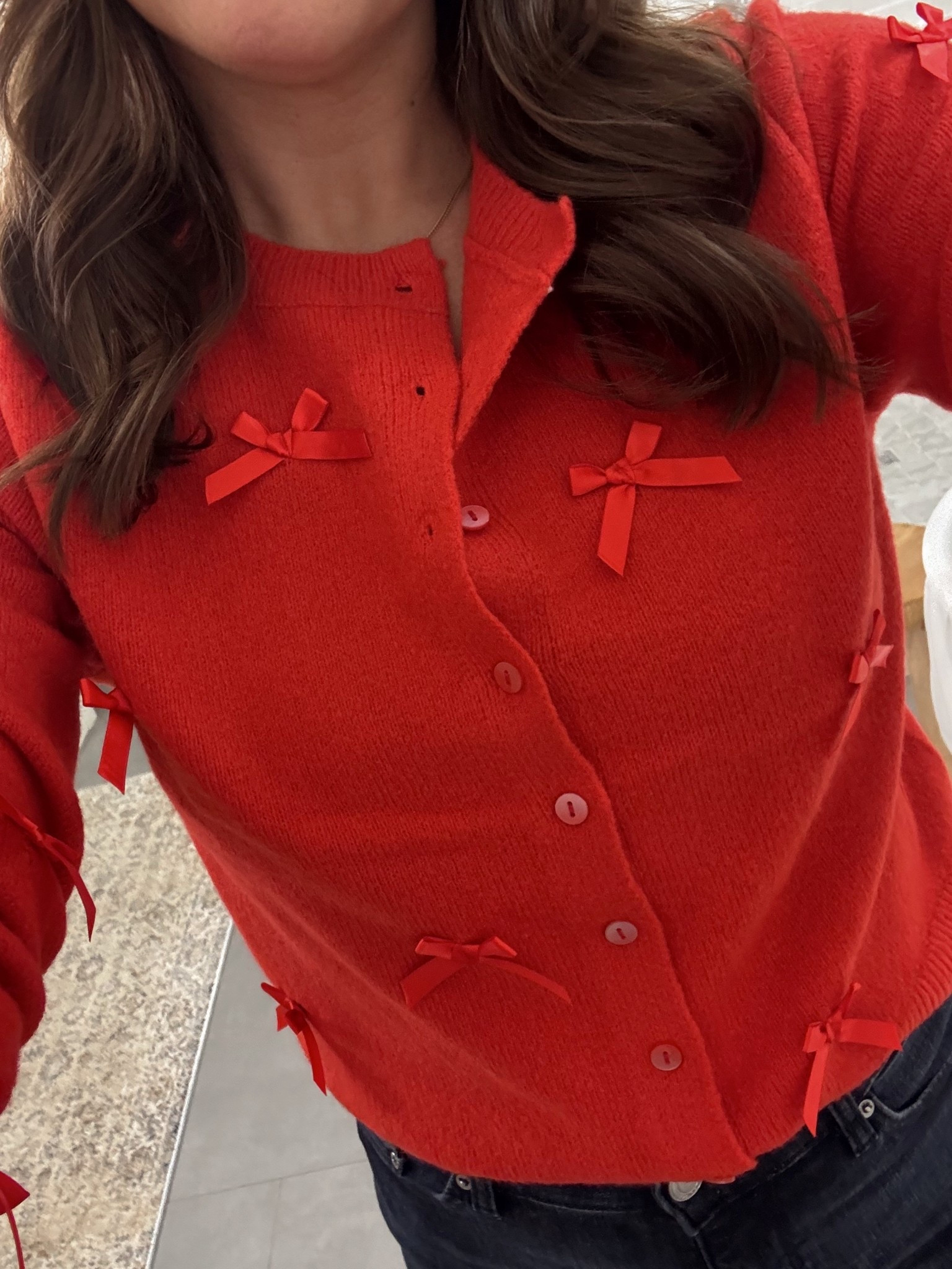 The cutest little bow sweater! Wearing a size small. 

#LTKFindsUnder50 #LTKHoliday #LTKootd