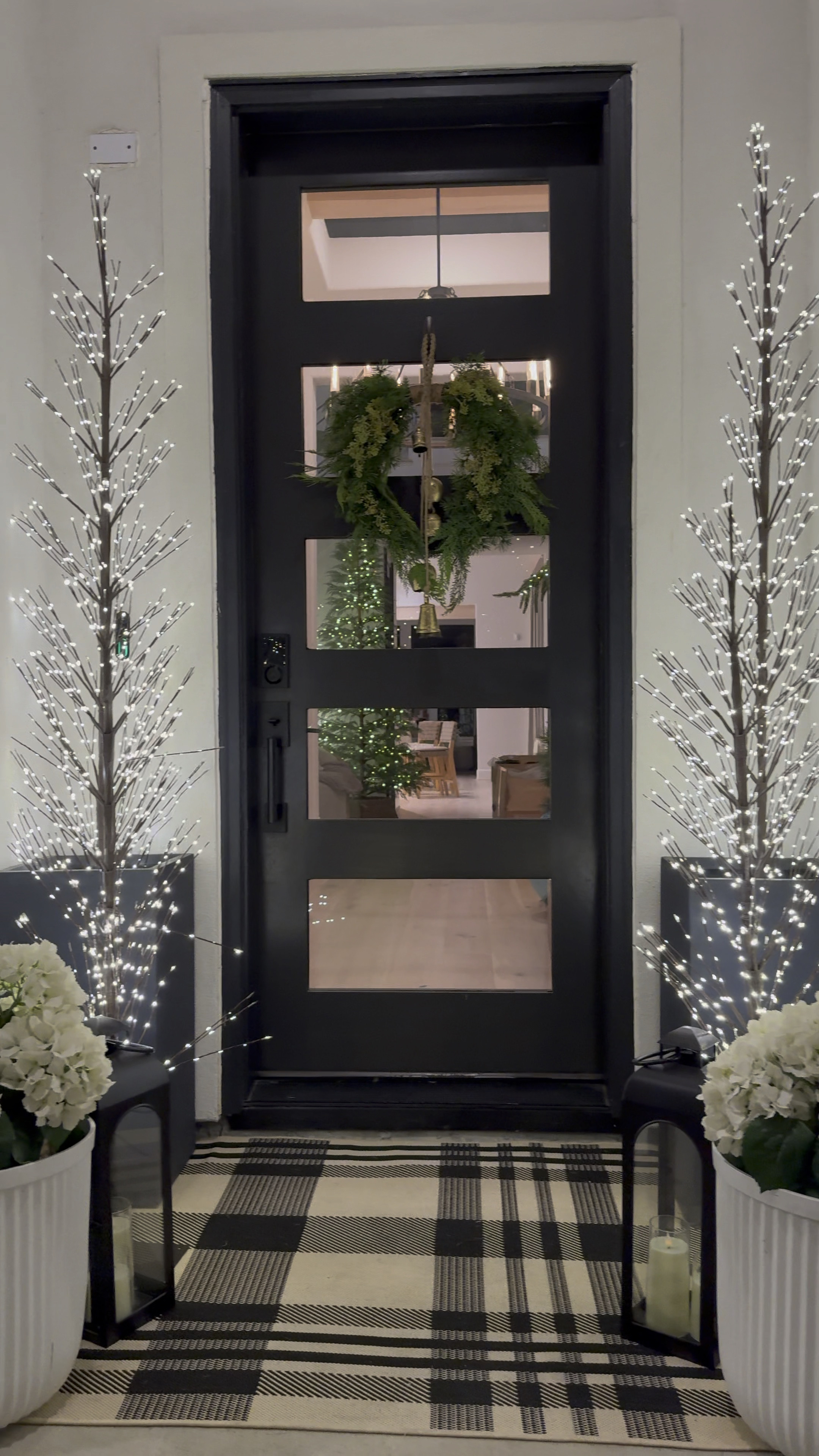 Elevate your holiday decor with these must-have twinkle lights! Perfect for indoors and outdoors, they add a magical touch to your front door. 

🎄

Curation Details: I used 2 Large & 2 Medium sized twinkle trees on each side. They come in L,M,& S!  

Rug is a 4' x 5'7"
and is washable and comes in multiple sizes as well ….🤎

Black planters come in 3 sizes… I used the  27.6Inch size. 🤎 White planters also come in multiple sizes. This curation has the Large size!

I used the S,M, & L Lanterns sizes on each of the sides and placed battery powered candles in them. 

Scroll down to shop!

#LTKSaleAlert #LTKHome #LTKHoliday