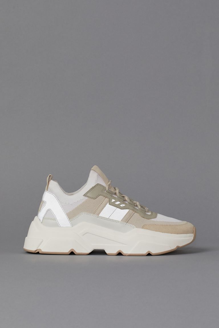 Sneakers in faux leather and faux suede with mesh sections and reflective details. Lacing at fron... | H&M (US + CA)