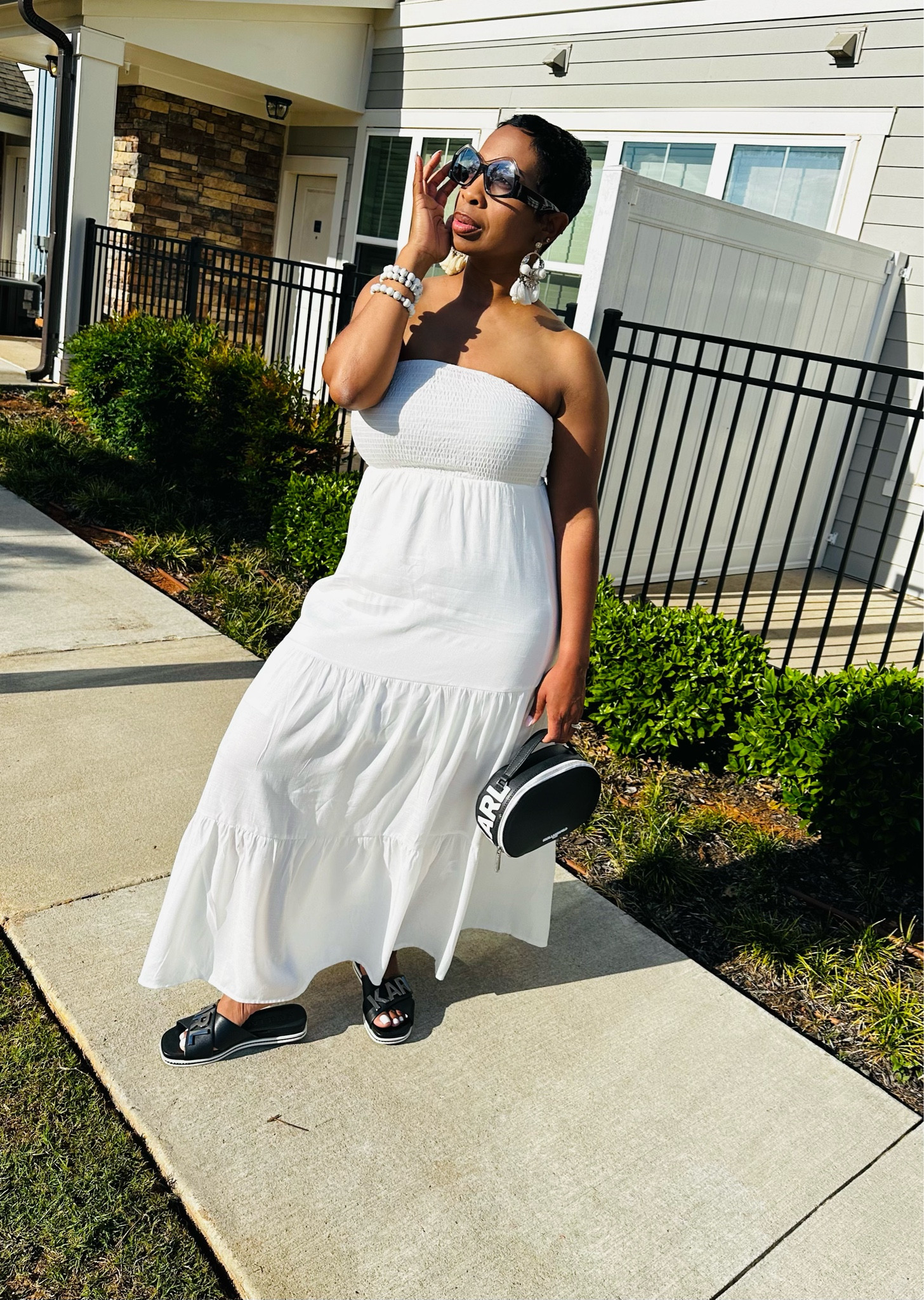 White linen, comfy dress with an option to tie bow in front. See model.

Wearing a Medium. I have another purse and shoe option.

#LTKStyleTip #LTKSeasonal #LTKFindsUnder50