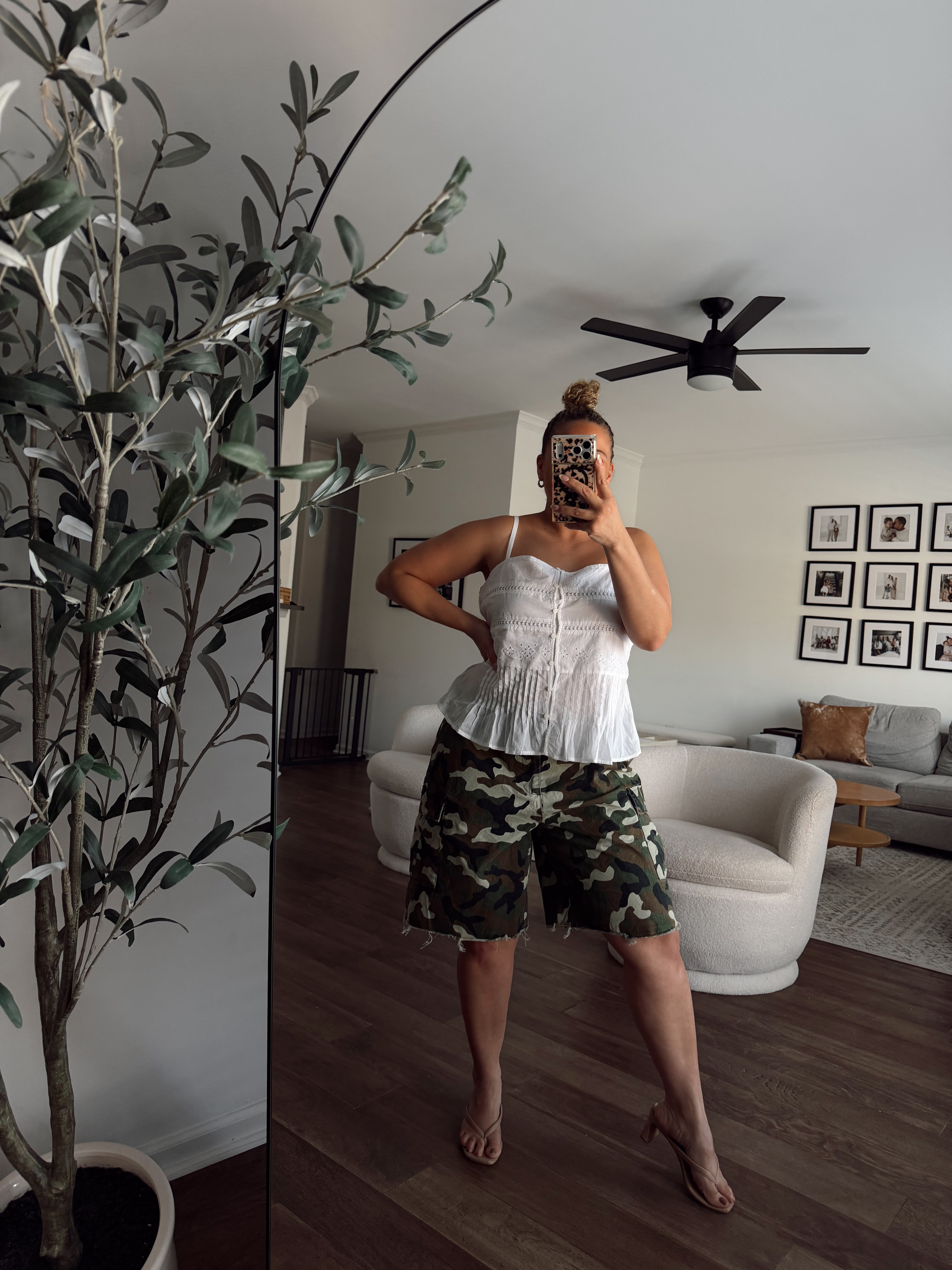 Loving this look for spring and summer, midsize outfit idea, camo shorts, size 12 style

wearing L in the tank and M in the shorts (they run big I'm usually a L/XL in shorts) 

 