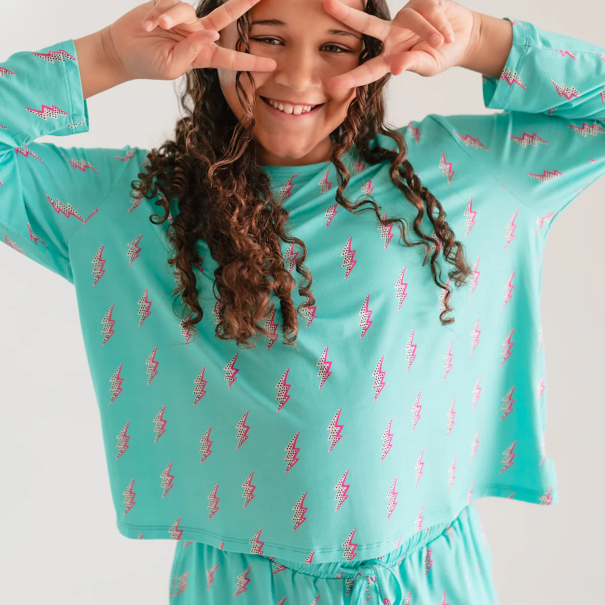 Girl's Long Sleeve and Ruffle Shorts Set in Neon Bolts | Silks Design