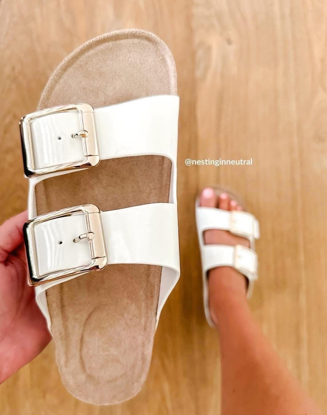 ON S🅰️🅰️🅰️🅰️🅰️🅰️LE!!! These were my most worn sandals last summer! They remind me so much of Birks but are MORE COMFORTABLE! They will sell out…again! Run tts! 

Sandals, white, buckle

#LTKTravel #LTKSaleAlert #LTKSwim
