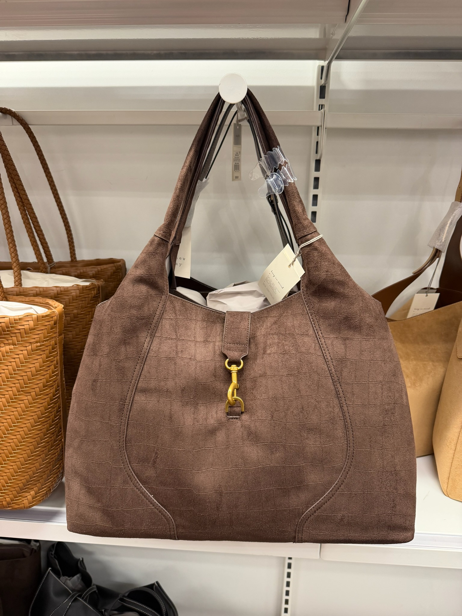 This new Target bag is giving designer for way less 🤎 The faux suede finish, croc texture, and slouchy shape make it look so much more expensive - and it’s currently 25% off for only $30. Such a good everyday bag for transitioning into fall!

wedding guest dress summer, teacher outfits, country concert outfits, back to school outfits, date night outfits, vacation outfits beach, business casual workwear, summer outfits over 40, summer dresses, concert outfit ideas
 

 #LTKgrwm #LTKootd #LTKSeasonal
