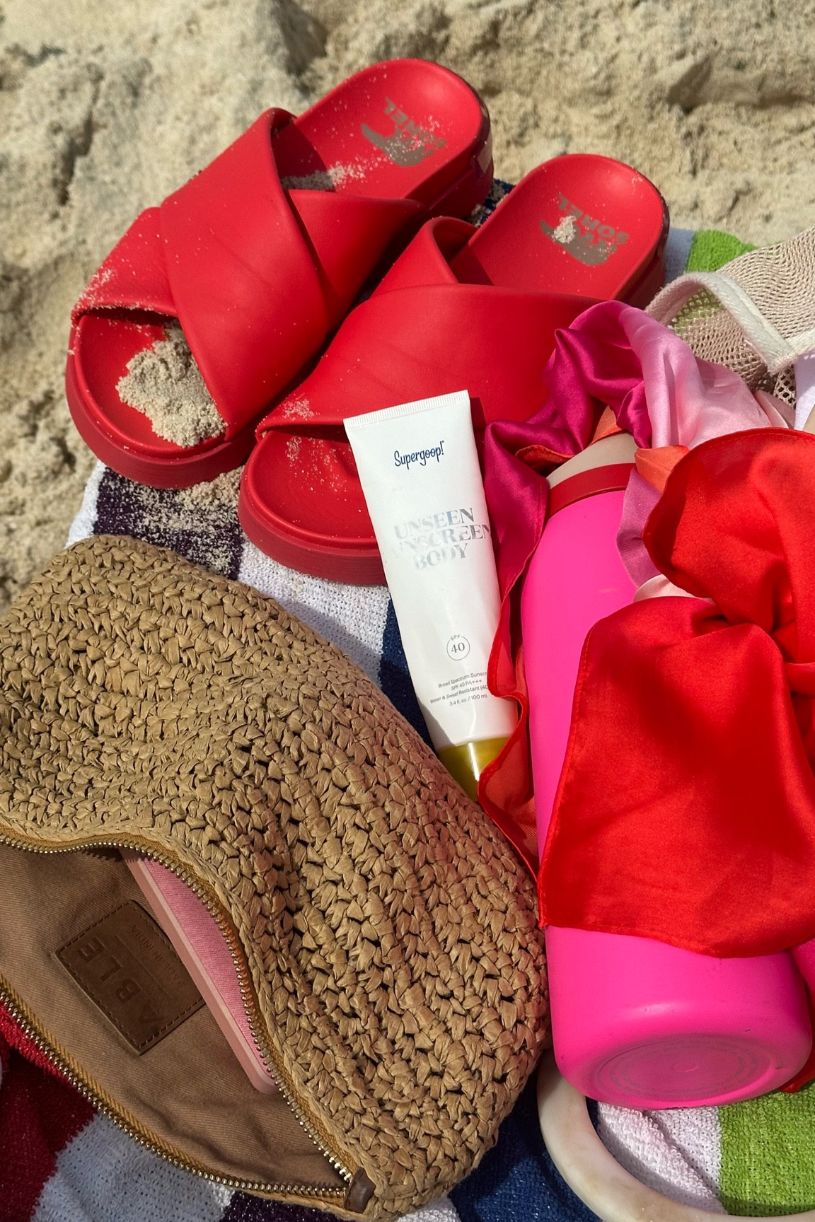 Here’s what I bring to the beach EVERY TIME! If you’re looking for the right travel accessories to add to your vacation outfit, these are it! You have to have a water bottle safe from the sand, that’s Owala! “You need an Owala!” And a head scarf for your hair after getting out of the water. I love the large size from Amazon I linked here! Able has such high quality bags that have traveled with me for over a year and are still in great shape! And the slides! They’re from Sorel! They are so cute for every spring outfit and will be perfect for summer on the boat! I never leave home without Supergoop! This unseen body sunscreen feels like primer on your skin! It’s amazing!!! 

#LTKtravel #LTKbeauty #LTKswim