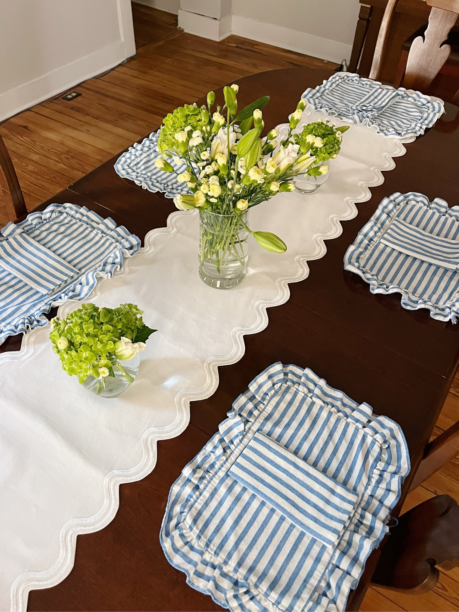 Striped linen placemats and napkins! These are SO cute and I want in all the different colors… very coastal vibe but still classic 🤍💙🤍 


// striped home decor, coastal grandmother style, dining table place settings, tablescapes, grandmillenial style, coastal home decor 

#LTKHome #LTKFindsUnder50 #LTKSeasonal