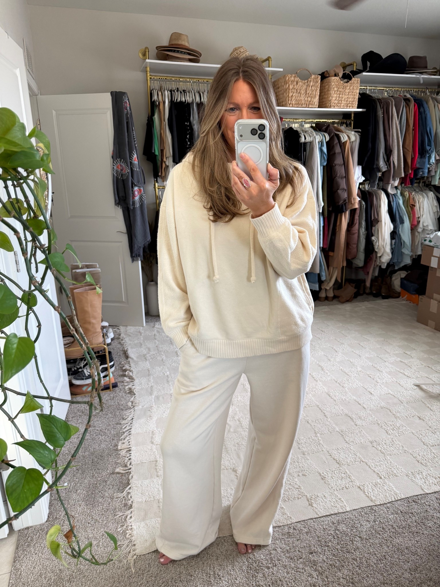 Cozy lounge matching set, wearing a large sweatshirt and medium long pants 

#LTKTall #LTKOver40