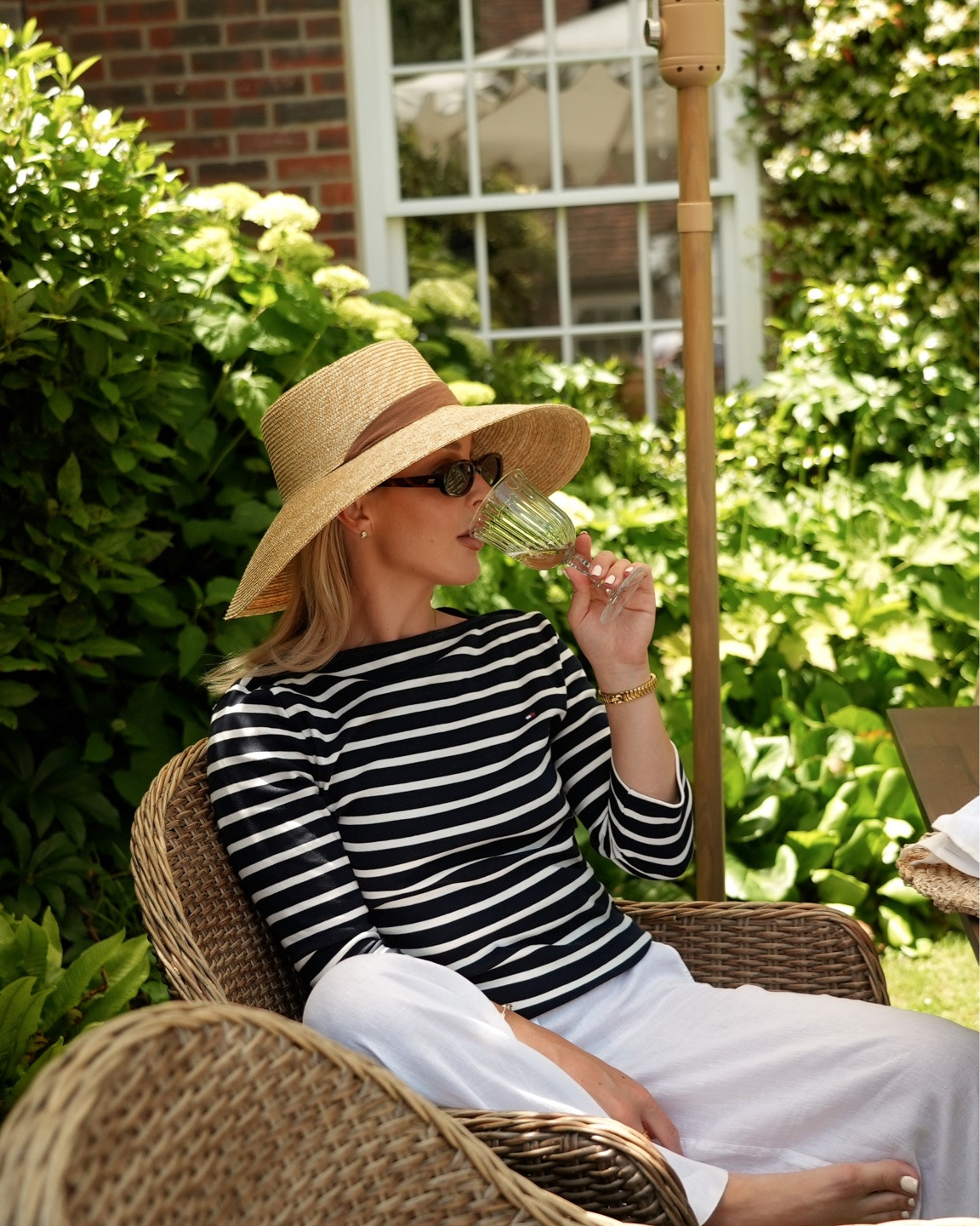 A casual outfit for a day in the garden or everyday summer look in comfy linen trousers and a stripe top from @tommy ad

#LTKsummer