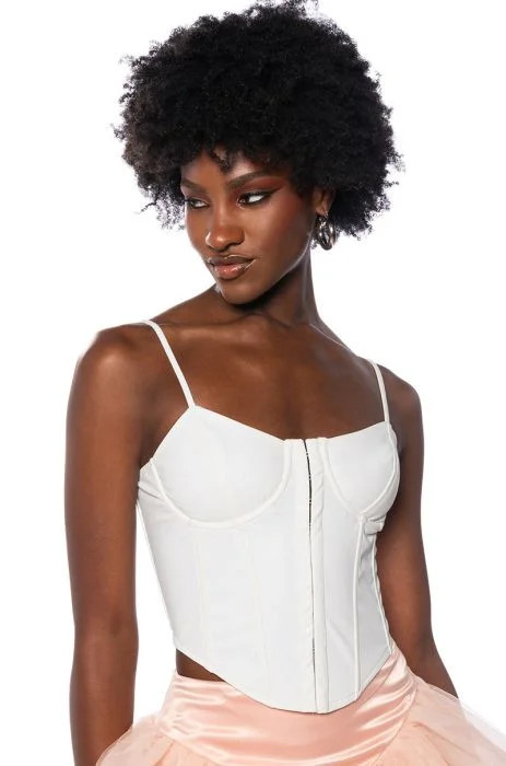 BE ABOUT IT SLEEVELESS FAUX LEATHER CORSET IN WHITE | AKIRA