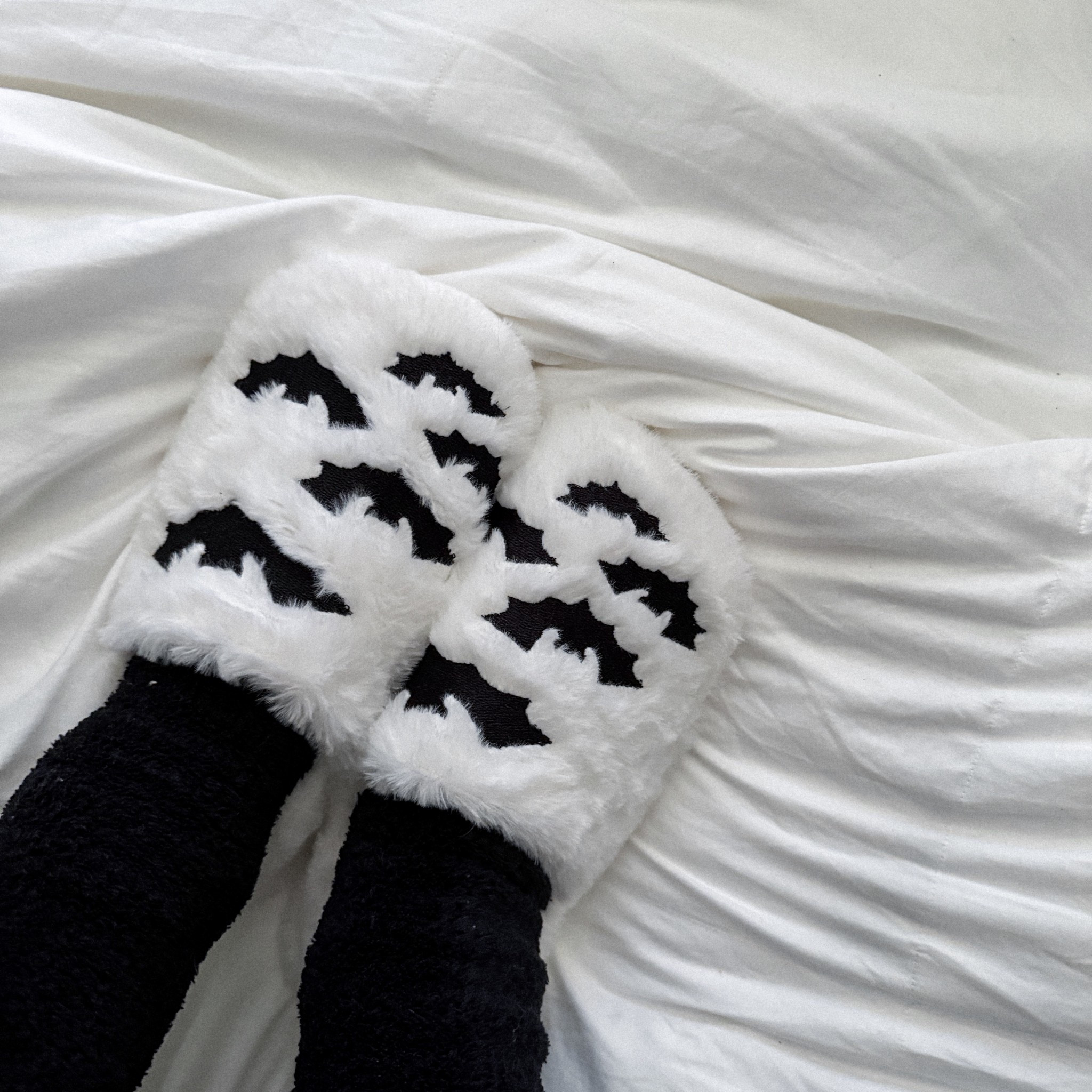 found the cutest (and coziest) bat slipper socks + will be living in them all fall 😂🦇☁️ 

#LTKShoeCrush #LTKHalloween #LTKSeasonal