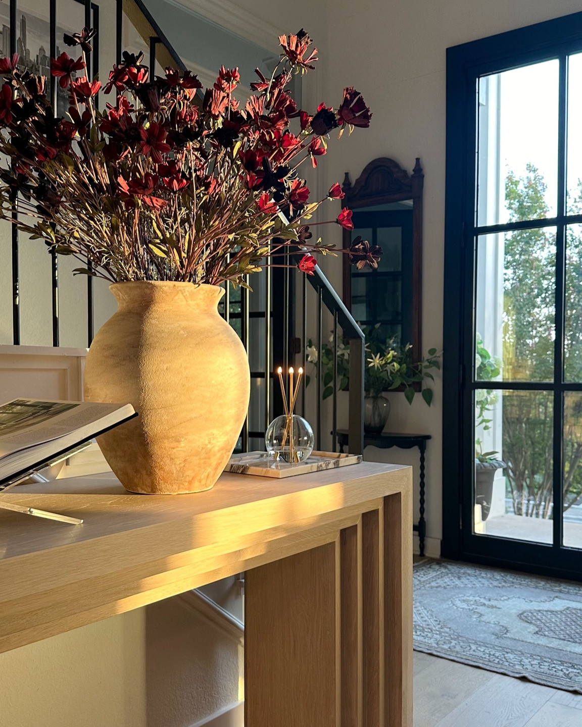 Fall transition entryway decor 🖤 I used 3 bunches of these stems in this gorgeous new pottery vase! Such a big statement!

#LTKSeasonal #LTKHome #LTKStyleTip