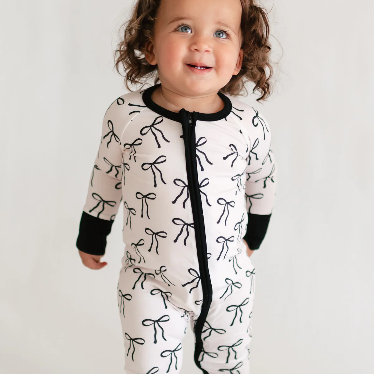Infant Romper in Black Bows | Silks Design