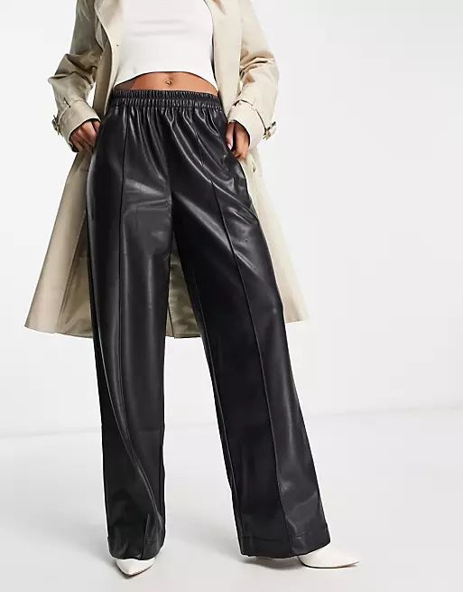 ASOS DESIGN leather look oversized wide leg pants in black | ASOS (Global)