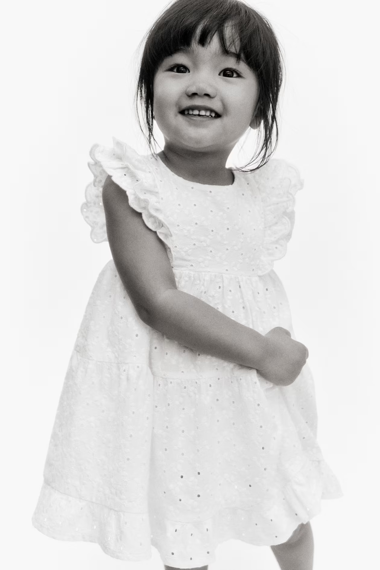 Kleid mit Volants und Broderie Anglaise | H&M (DE, AT, CH, NL, FI)