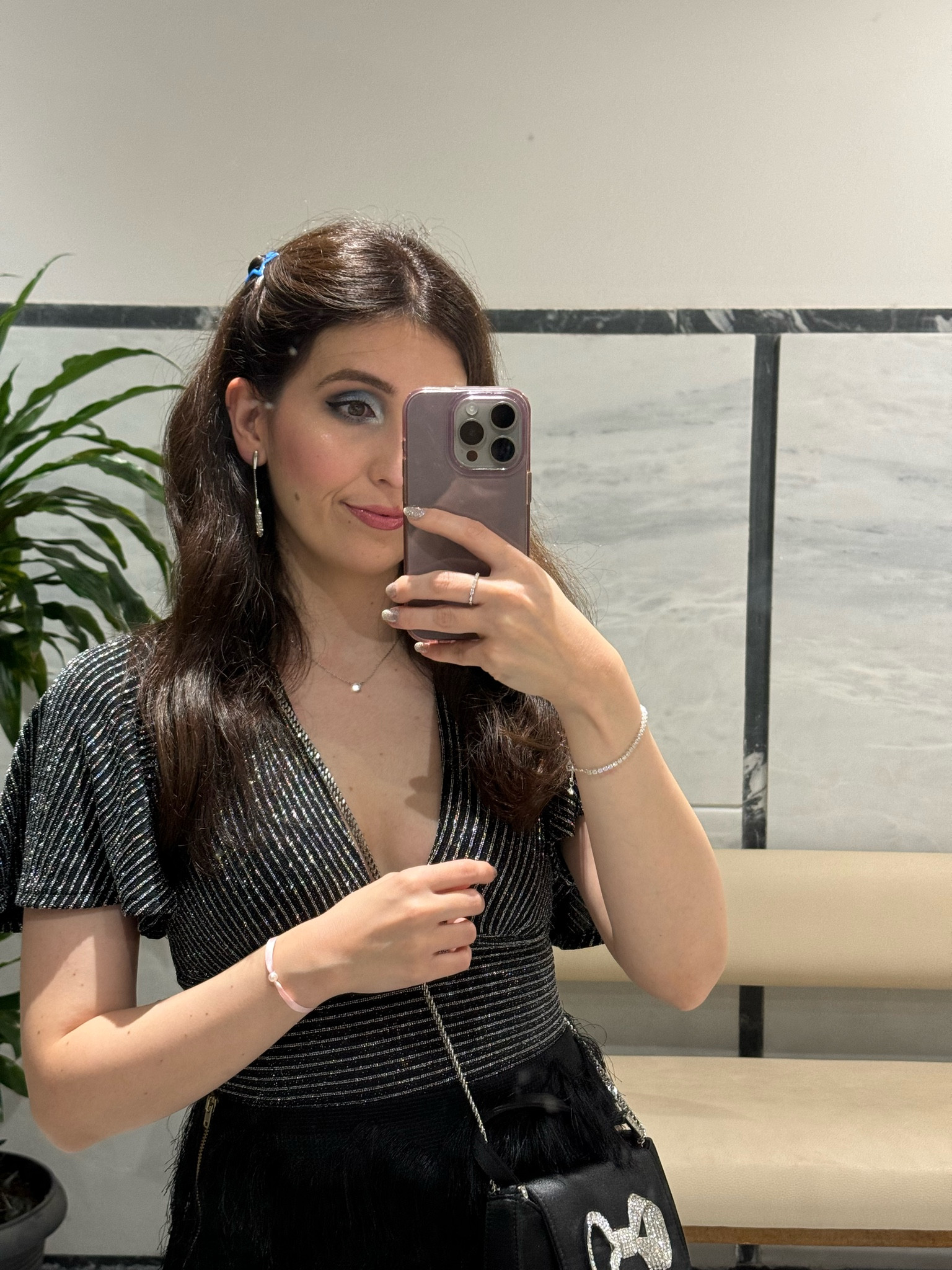 I’ve started the wedding recap over on my social media accounts and I realized I never posted the details if my disco outfit here!
I chose silver jewellery, glittery silver nail polish, a black bag with a silver bow and a cute little blue hair accessory in a star shape. My eye makeup is in blue and grey tones to match with the blue theme that I wanted to keep on all the wedding outfits.
For the bachelorette I created cute and minimal bracelets with ribbon and pearls. I had a light pink as a maid of honour and the other friends had a bright pink. Obviously the bride had white 😛
For my eye makeup look I used Colourpop eyeshadows. The blue and grey are my friend’s super shock eyeshadows that are not available anymore on the website. They have blue palettes though with identical colours that I used. For the rest I used the It’s a Princess Thing eye palette from Colourpop that I love!

#LTKpartywear #LTKeurope #LTKwedding