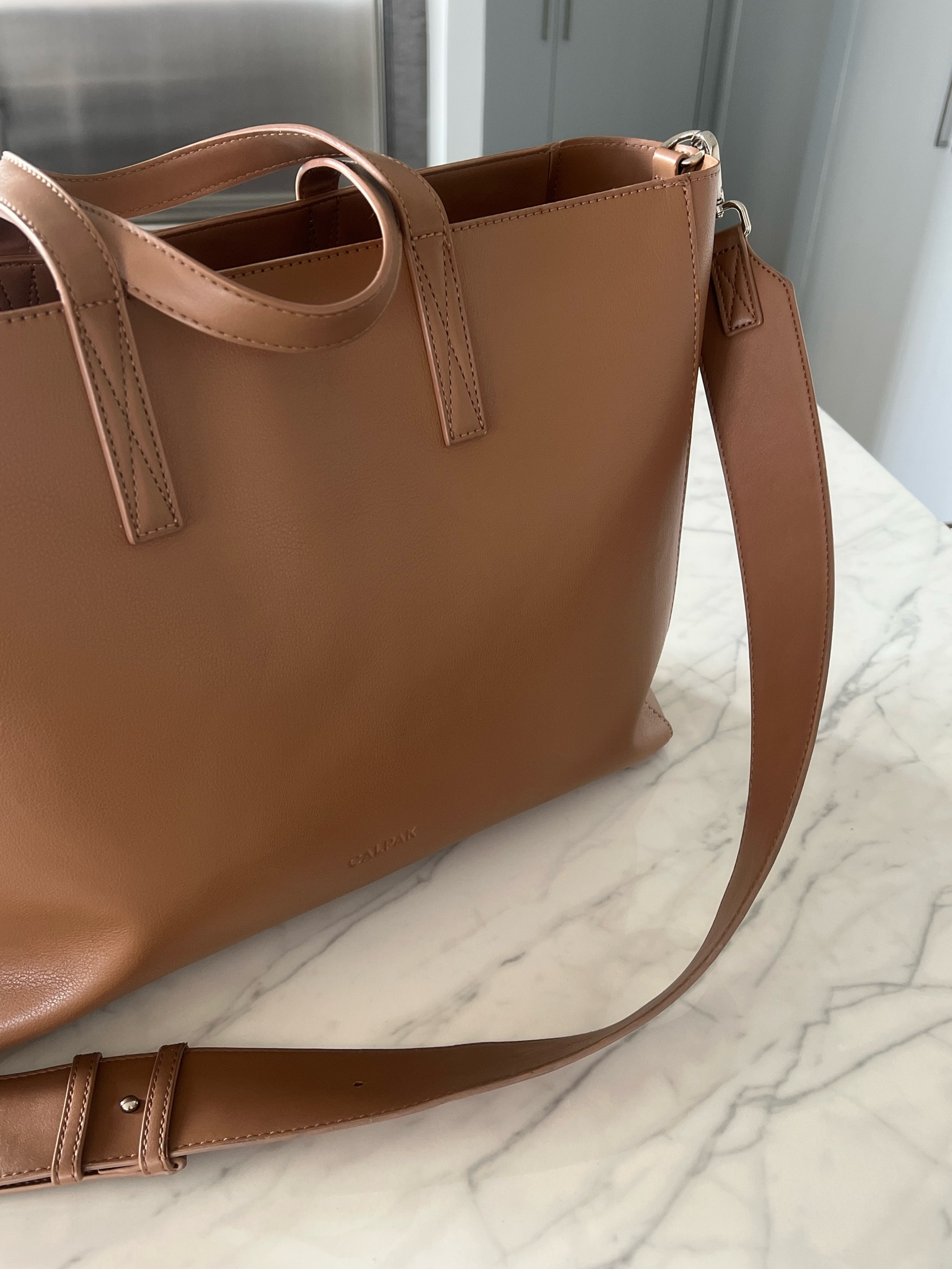 Calpak still has a 20% off sale going 🤍 

My tote is down to 142 from 178! 🫶🏻


Work bag | office bag | work tote | laptop bag | chic work bag 

#LTKworkwear #LTKCyberWeek #LTKitbag