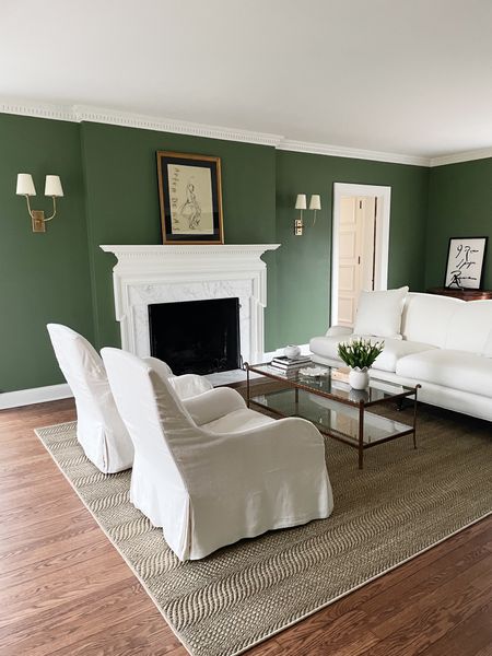 The green room. I linked our sconces, sisal rug, coffee table, and some of our coffee table accessories here. The rest is linked on my blog - just search “sources” 

#LTKhome #LTKFind