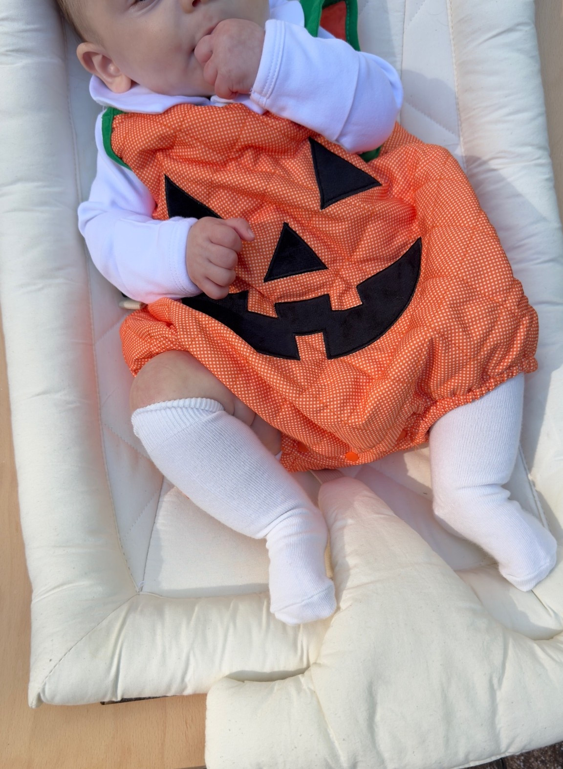 Pumpkin costume for baby’s first Halloween
