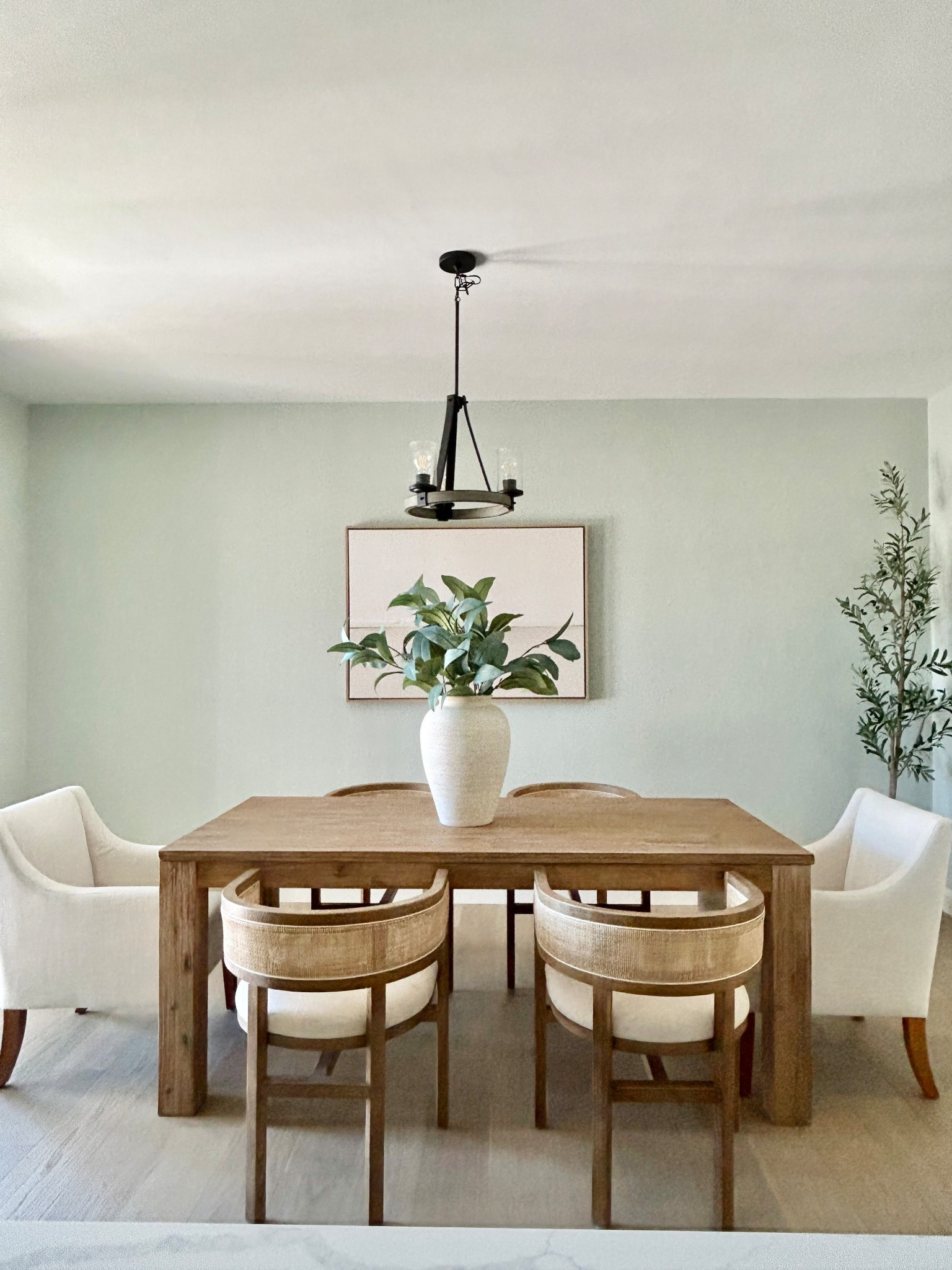 Dining room. Wood curved cane back dining chairs.  Rectangle wood dining table.


#diningchairs

#LTKHome